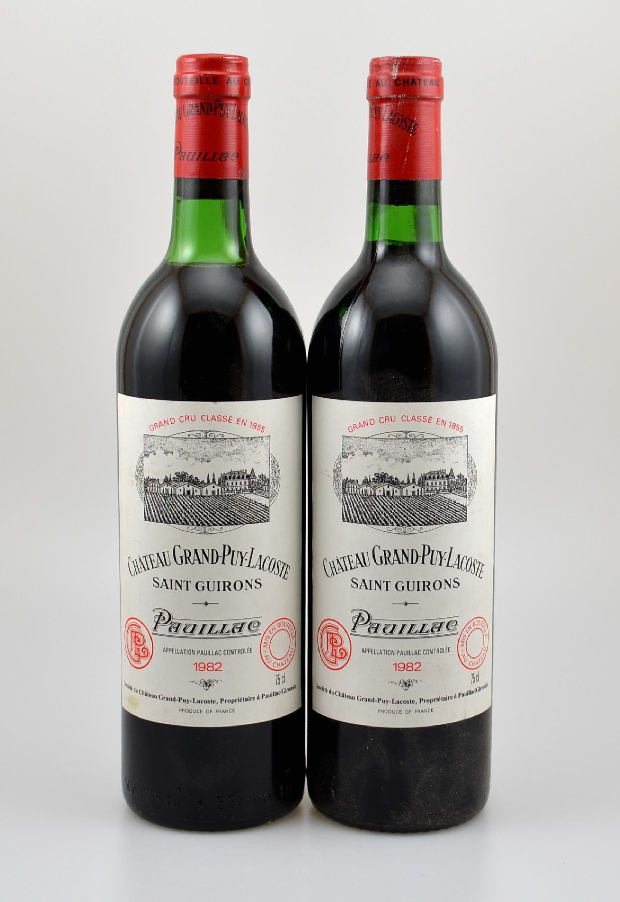 2 Flaschen 1982 Chateau Grand-Puy-Lacoste, Saint Guirons, Pauillac, Grand Cru Classe, je 75 cl, Füllstände: ca. top shoulder bis into neck, ...