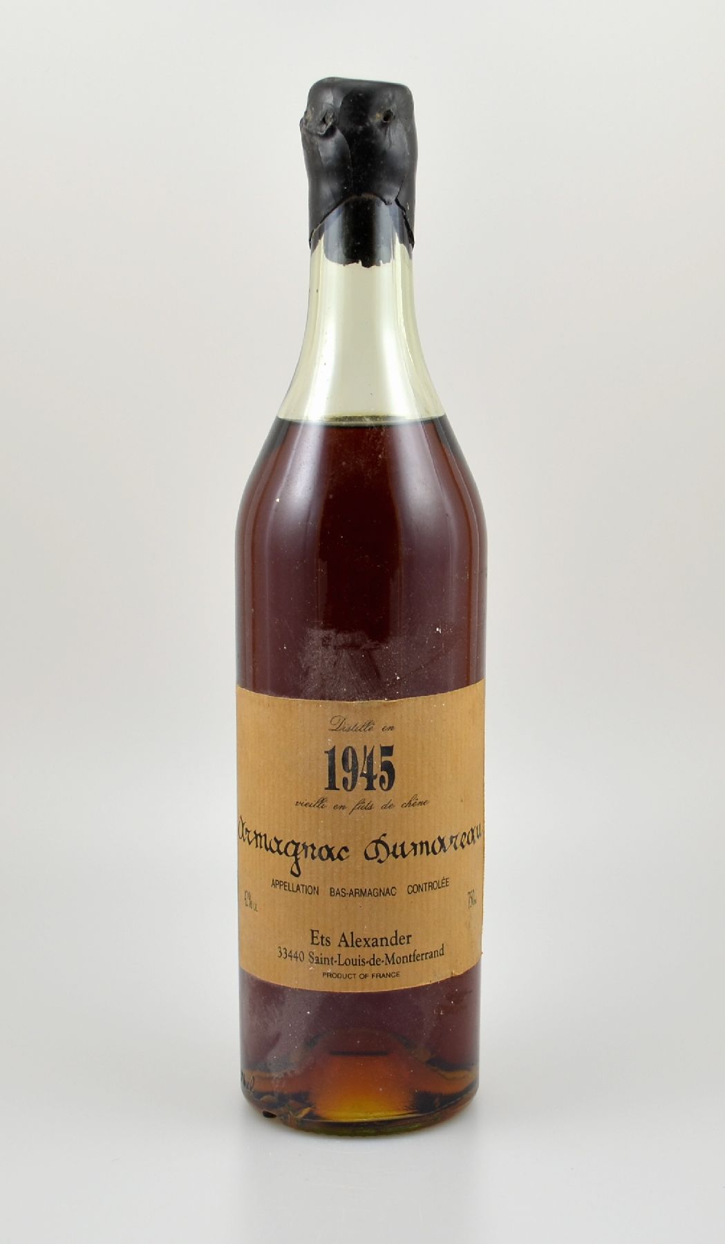 1 Flasche 1945 Armagnac Dumareau, ca. 70 cl, 42 % Vol., Abstand zwischen Kapselwachs und Armagnac: ca. 4 cm, hergestellt und abgefüllt für Ets ...