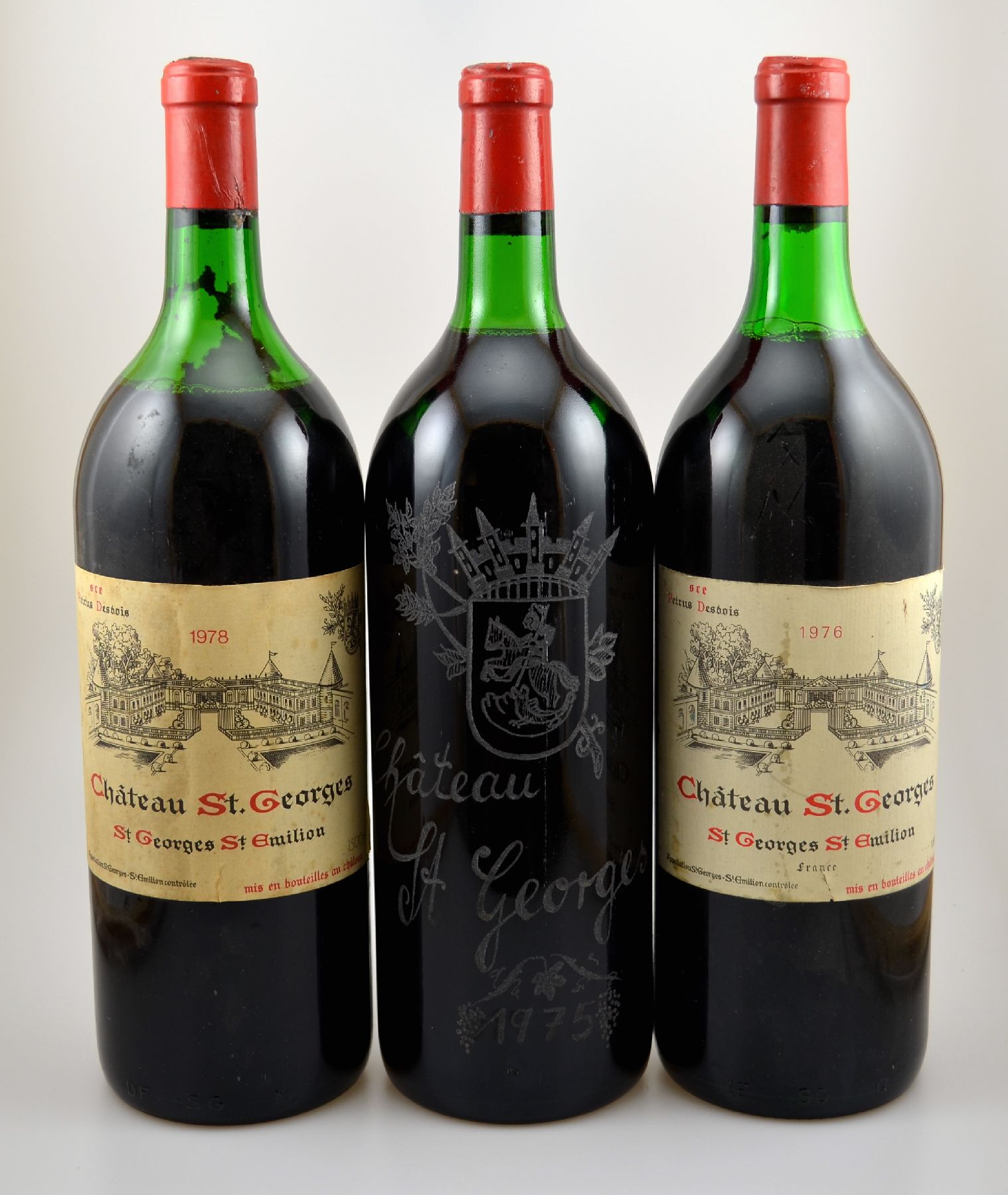 3 Magnumflaschen Chateau St. Georges, St. Georges St. Emilion, Jahrgänge: 1975, 1976 1978, je ca. 150 cl, Etiketten z.T. beschmutzt, eine Flasche ...