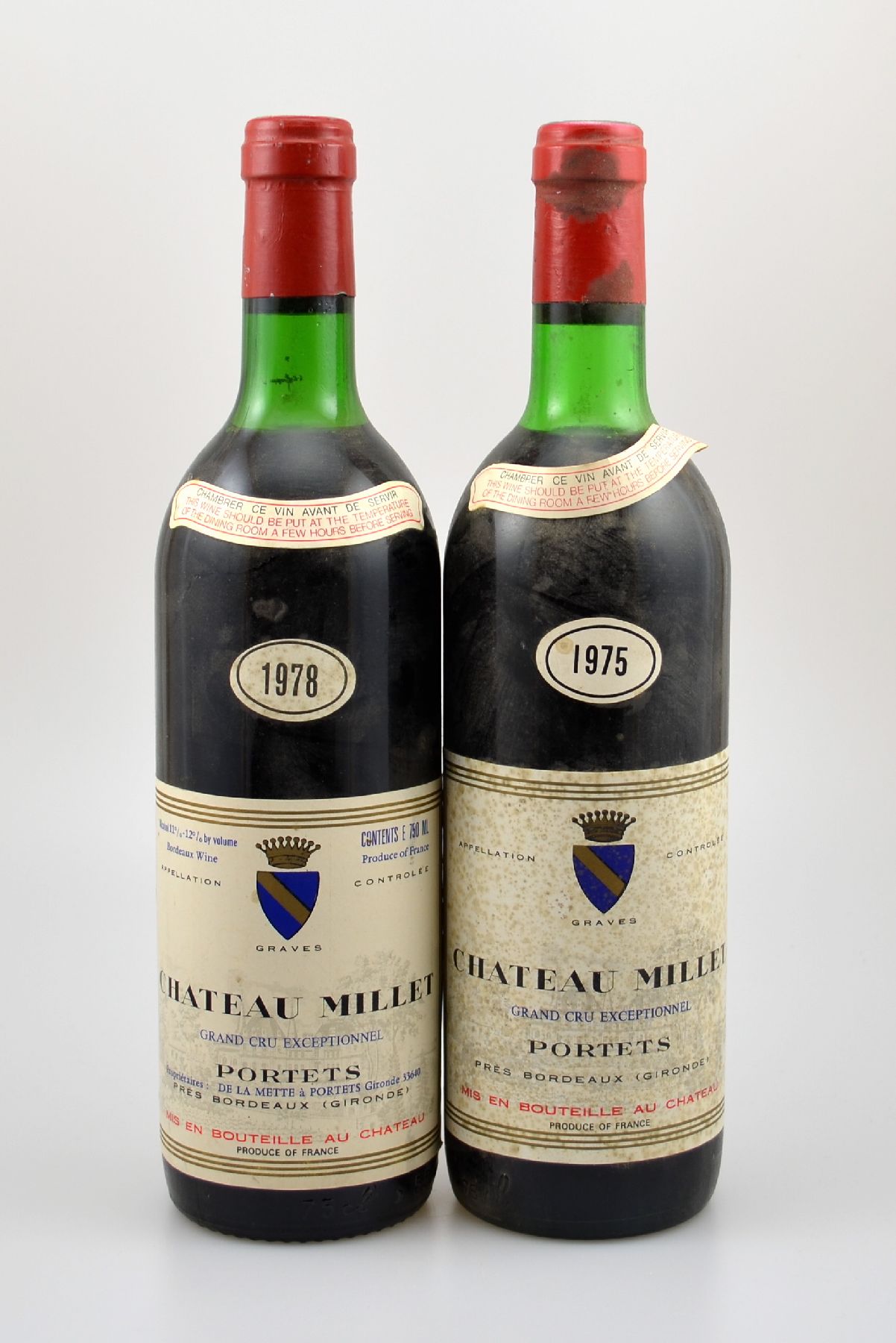 2 Flaschen Chateau Millet Graves, Grand Cru, Jahrgänge: 1978 & 1975, je ca. 75 cl, Etiketten z.T. fleckig bzw. beschmutzt, unverkostet, Provenienz: ...