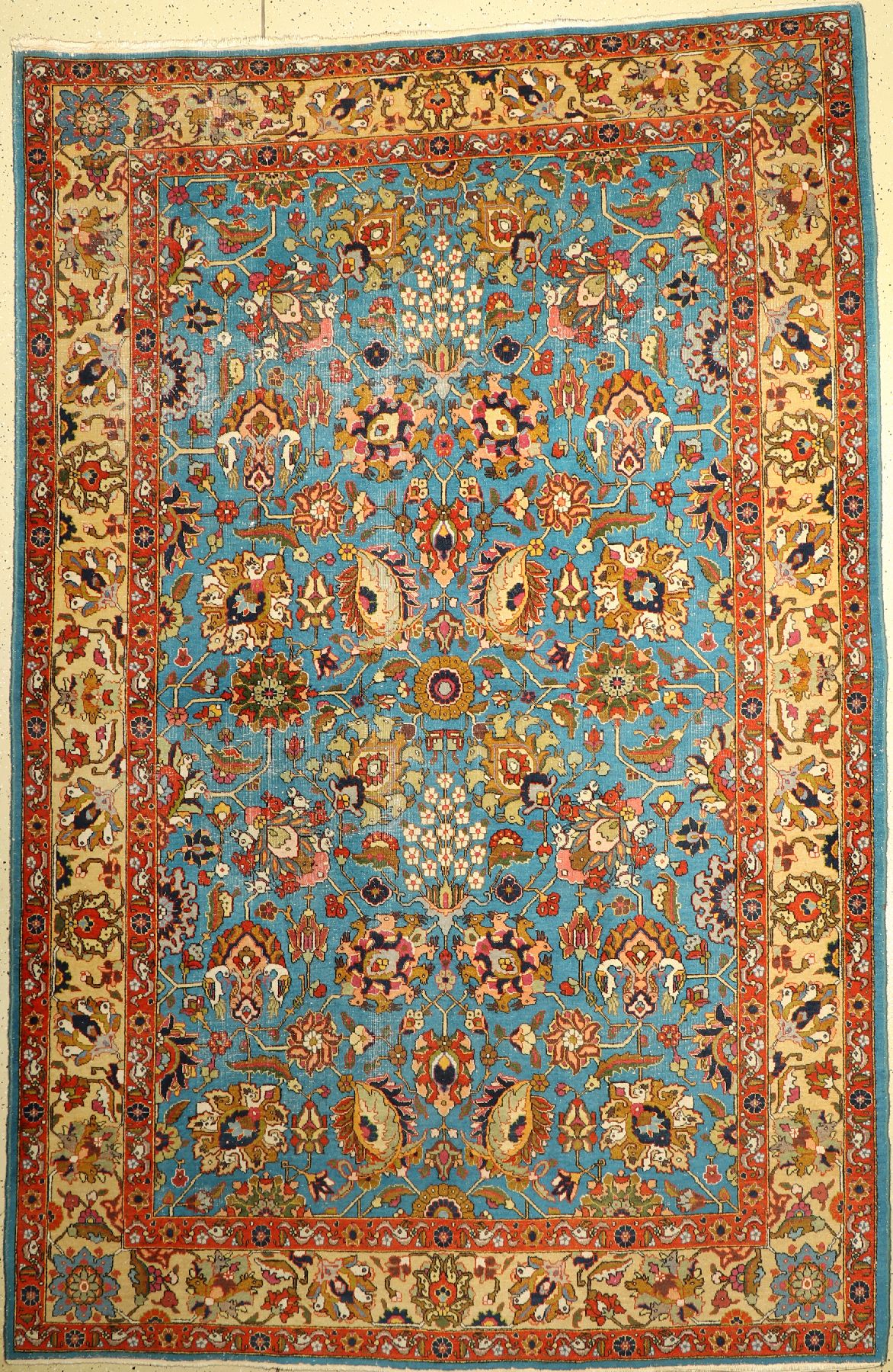 Täbriz alt, Persien, um 1930, Wolle auf Baumwolle, ca. 324 x 219 cm, Blüten mit Tierköpfen, Türkisgrundig, EHZ: 4