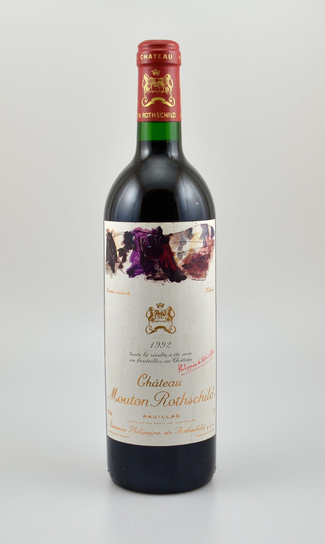1 Flasche 1992 Chateau Mouton Rothschild, Pauillac, Premier Grand Cru Classe, ca. 75 cl, 12,5 % Vol., Füllstand: into neck, Etikett min. beschmutzt, ...