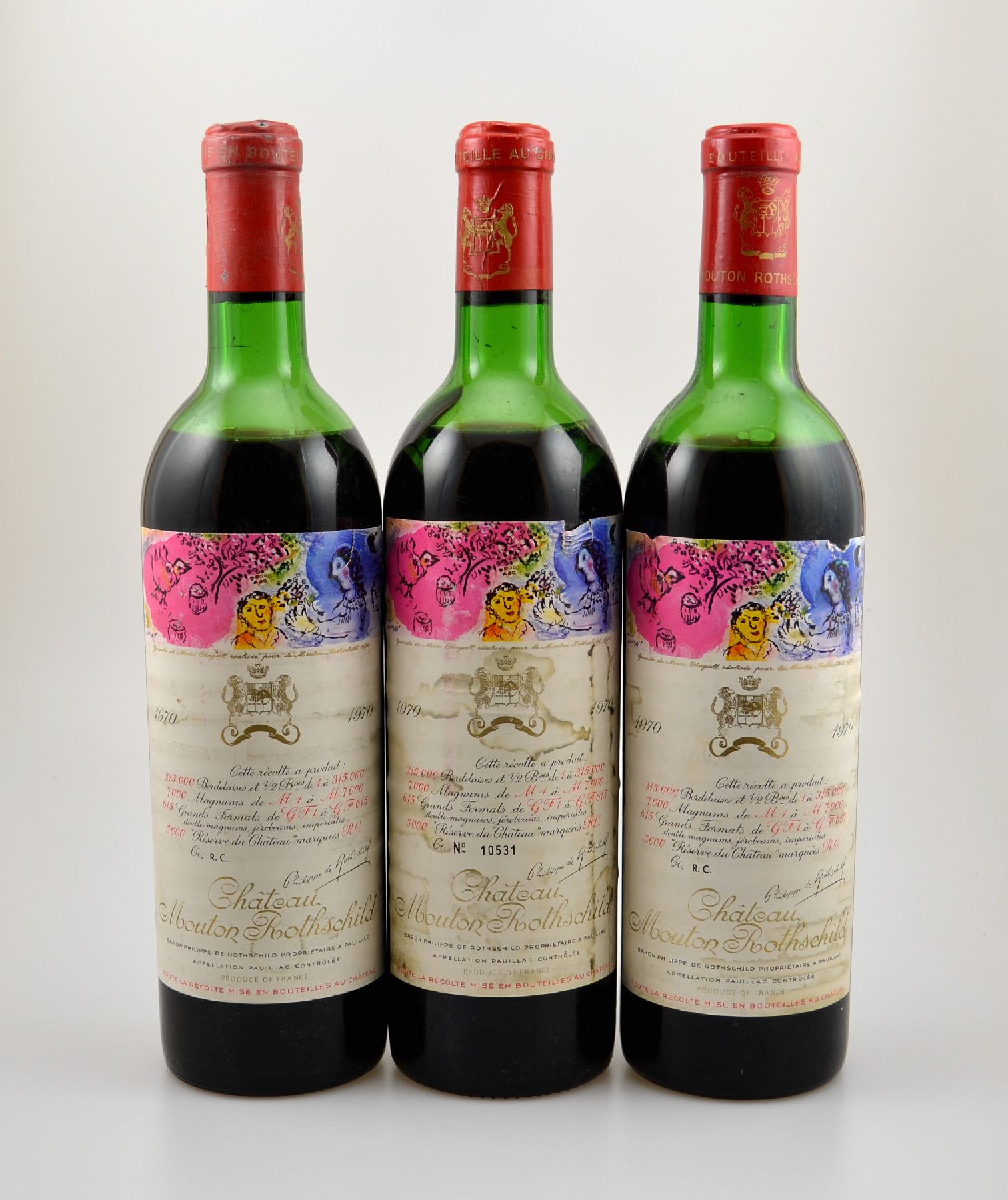 3 Flaschen 1970 Chateau Mouton Rothschild, Pauillac, Grand Cru Classe, Füllstände: ca. lower mid shoulder bis mid shoulder, Etiketten z.T. fleckig ...