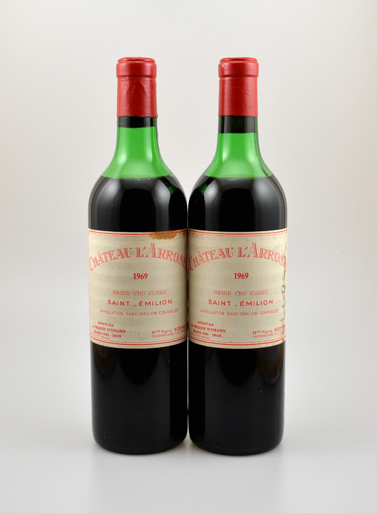 2 Flaschen 1969 Chateau L'Arrosee, Saint-Emilion, Grand Cru Classe, Füllstände: ca. mid shoulder, Etiketten z.T. beschmutzt, unverkostet, ...