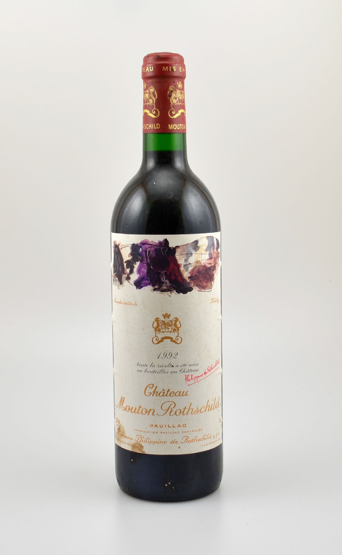 1 Flasche 1992 Chateau Mouton Rothschild, Pauillac, Premier Grand Cru Classe, ca. 75 cl,12,5 % Vol., Füllstand: into neck, Etikett min. beschmutzt, ...