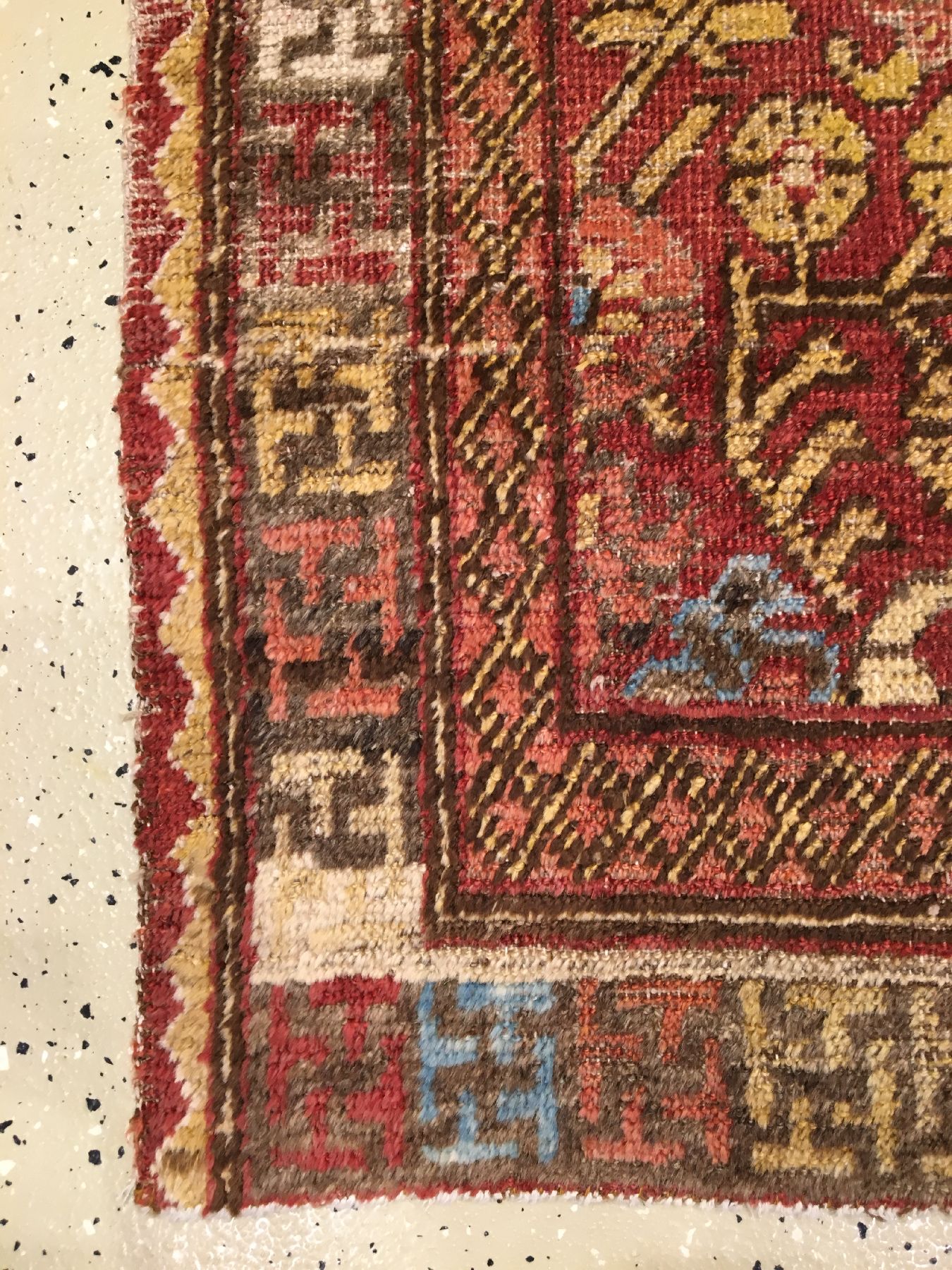 Detail h: Khotan antik, Ostturkestan, Mitte 19.Jhd., Wolle geknüpft auf Baumwolle. Seltener kleinformatiger Khotan mit charakteristischen Blüten allover ...