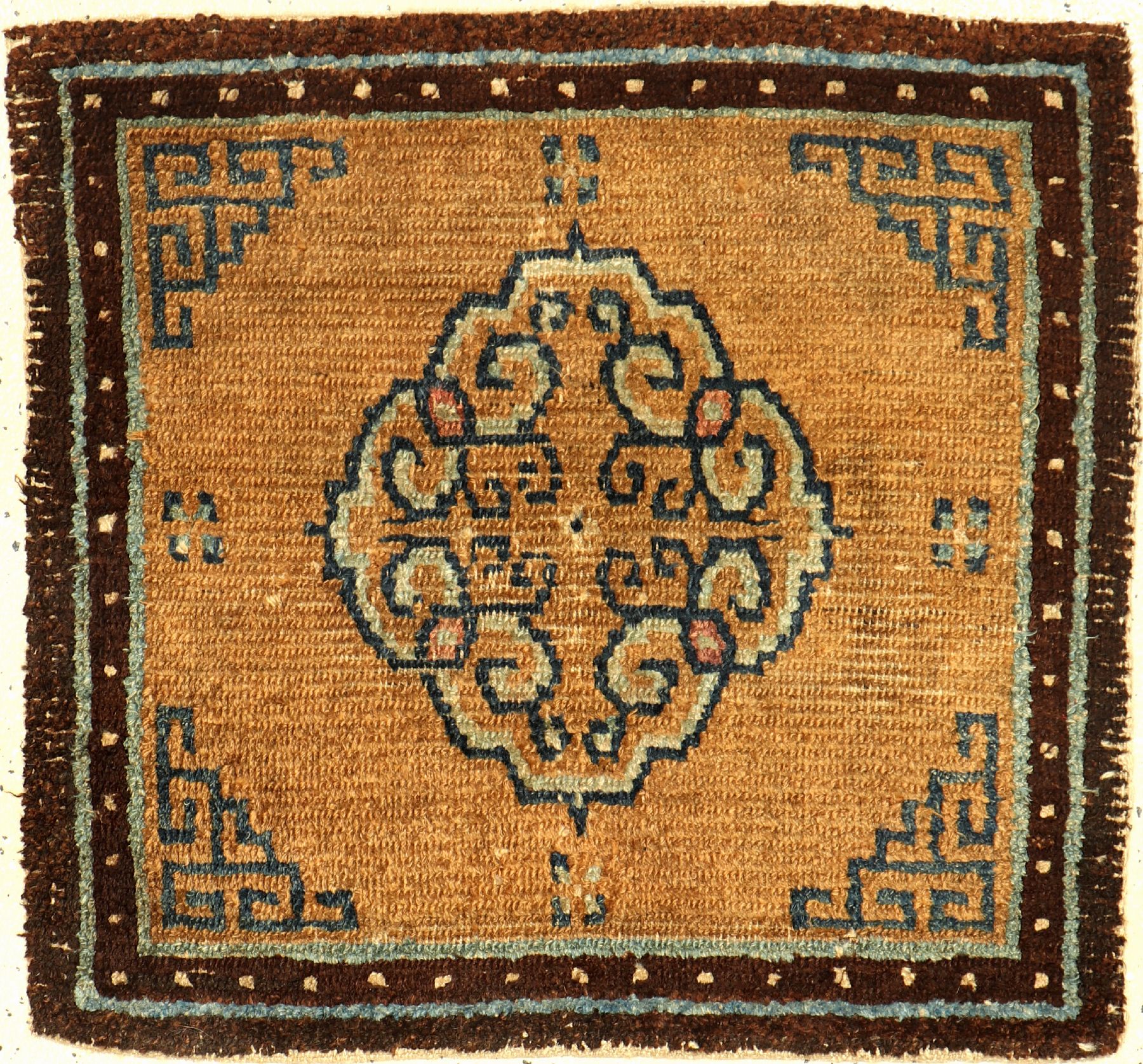 Tibetischer "Khagangma" antik, Südtibet, 1.Hälfte 19.Jhd., Wolle geknüpft auf Wolle. Früher Sitzteppich der tibeter mit Medaillon, ca. ...