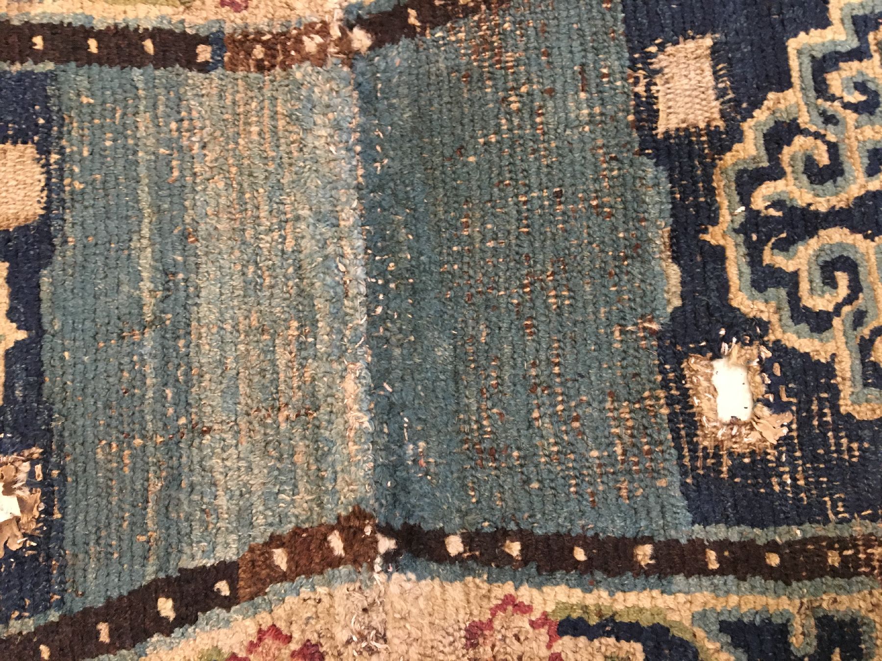 Detail f: Früher tibetischer "Makden" antik, Tibet, 1.Hälfte 19.Jhd., Wolle geknüpft auf Wolle. Seltener Sattel mit Wolkenband-Medaillons, ca. ...