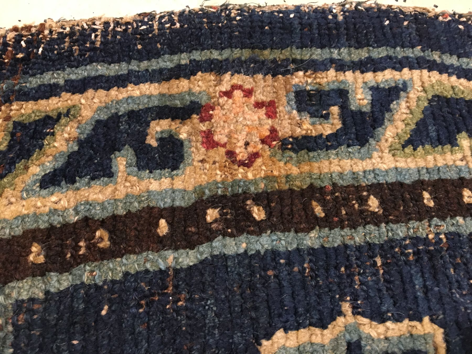 Detail g: Früher tibetischer "Makden" antik, Tibet, 1.Hälfte 19.Jhd., Wolle geknüpft auf Wolle. Seltener Sattel mit Wolkenband-Medaillons, ca. ...
