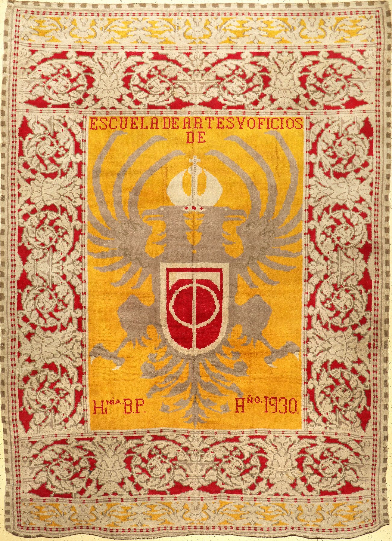 Großer spanischer "Wappen-Teppich" alt (Signiert: Escuela De Artes Y Oficios "Hi Ni.O. B.P.", Ano 1930), Spanien, um 1930 ...