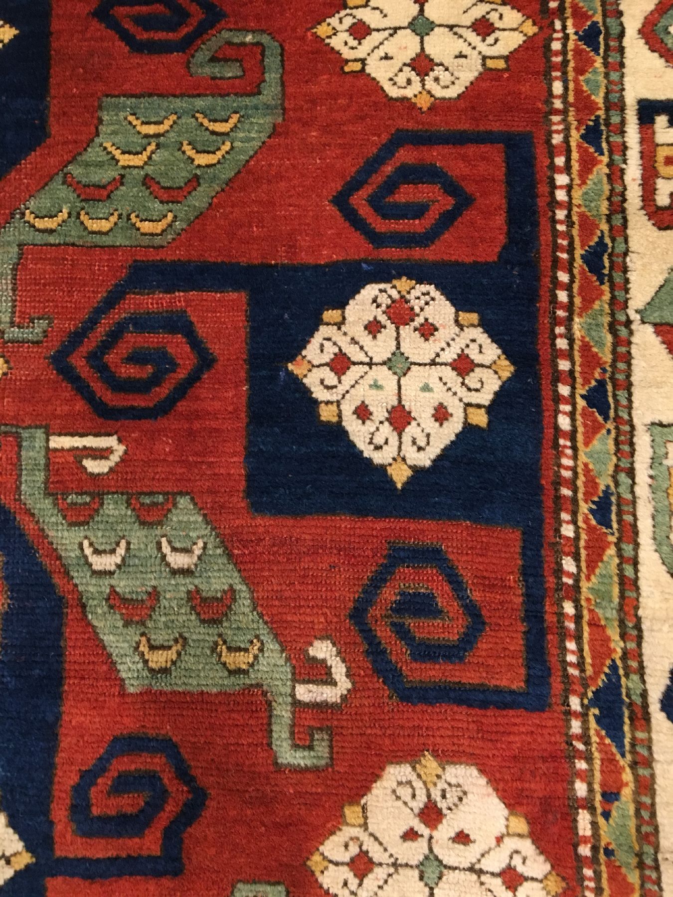 Detail d: Pinwheel Kasak antik (Swastika Kasak), Südwestkaukasus, 19.Jhd., Wolle geknüpft auf Wolle. Seltener Pinwheel Kasak mit typischen Muster aus ...