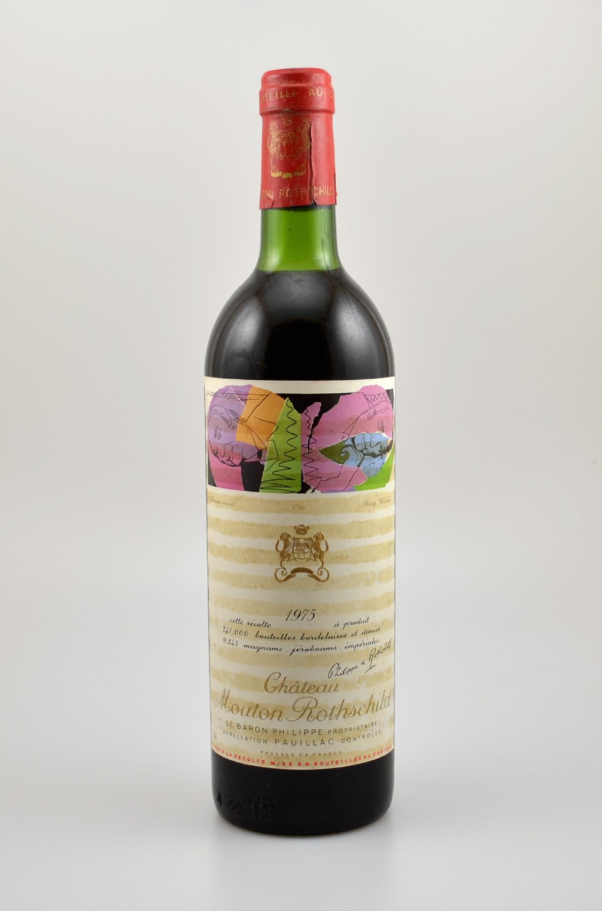 1 Flasche 1975 Chateau Mouton Rothschild, Pauillac, je ca. 75 cl, Füllstand: ca. top shoulder, Etikett beschmutzt, unverkostet, Künstleretikett von ...