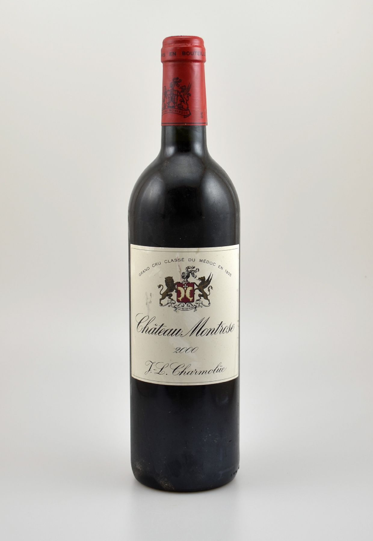 1 Flasche 2000er Chateau Montrose, Saint-Estephe, Grand Cru Classe, ca. 75 cl, 12,5 % Vol., Füllstand: into neck, Etikett l. beschmutzt, ...