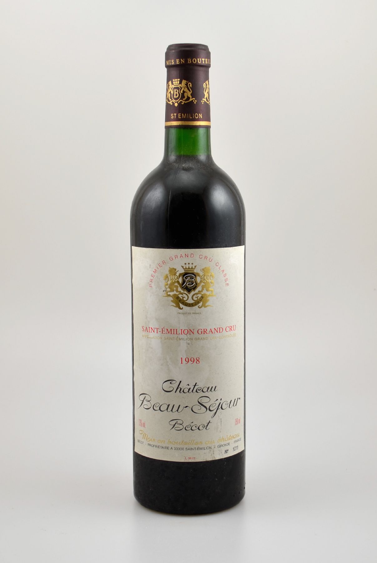 1 Flasche 1998 Chateau Beau-Sejour Becot, Saint-Emilion Grand Cru, ca. 75 cl, 13 % Vol., Füllstand: into neck, Etikett l. beschmutzt, unverkostet, ...