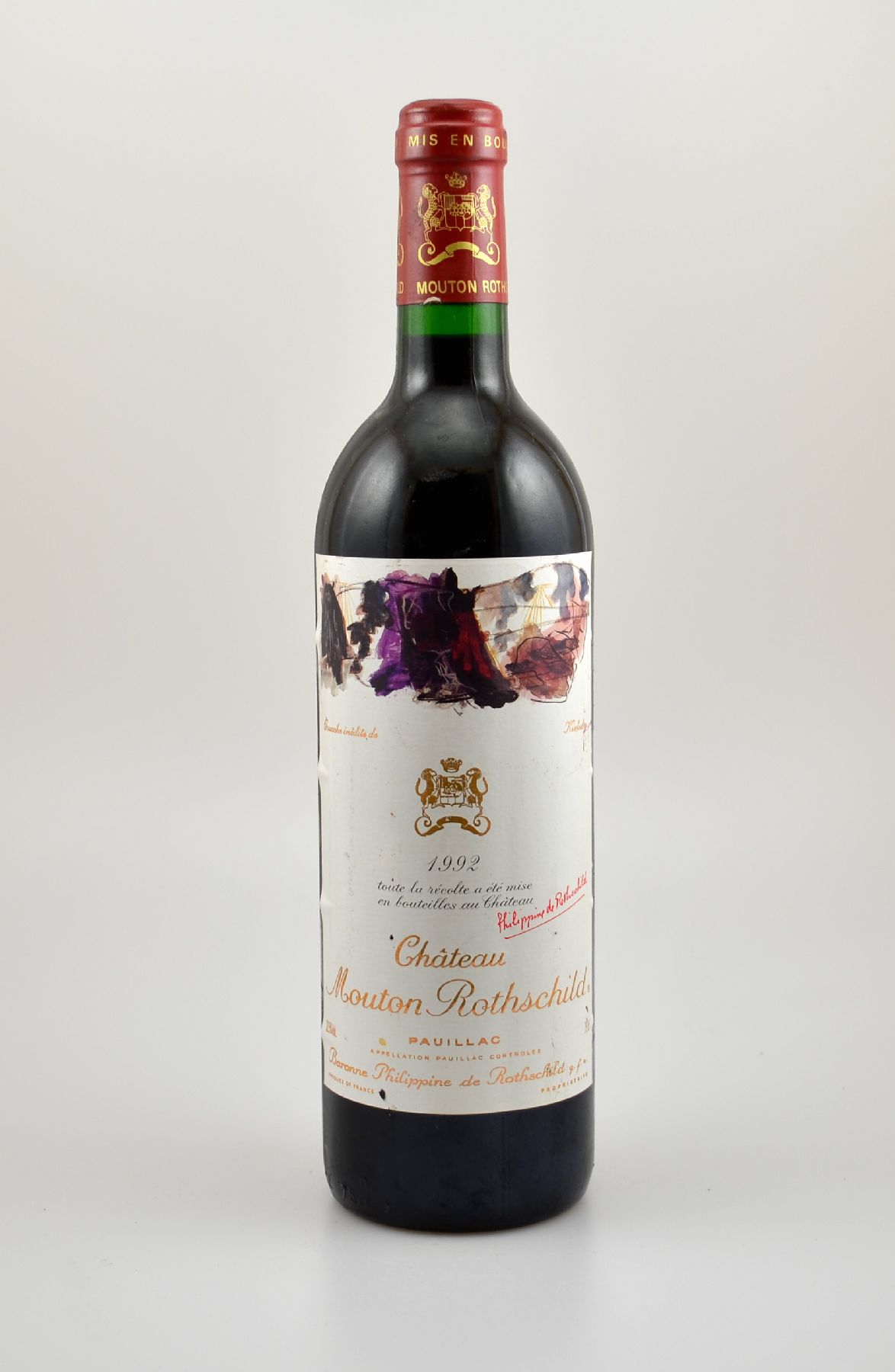 1 Flasche 1992 Chateau Mouton Rothschild, Pauillac, Premier Grand Cru Classe, ca. 75 cl,12,5 % Vol., Füllstand: into neck, Etikett min. beschmutzt, ...
