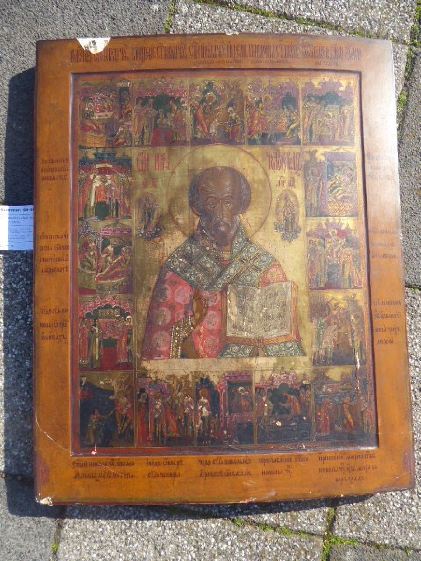 Detail b: Große Ikone, Russland, 18./19. Jh.,, Vielfelderikone, Farben teilweise gelockert, ca. 54 x 43 cm, am oberen Rand teilweise abgeblättert
