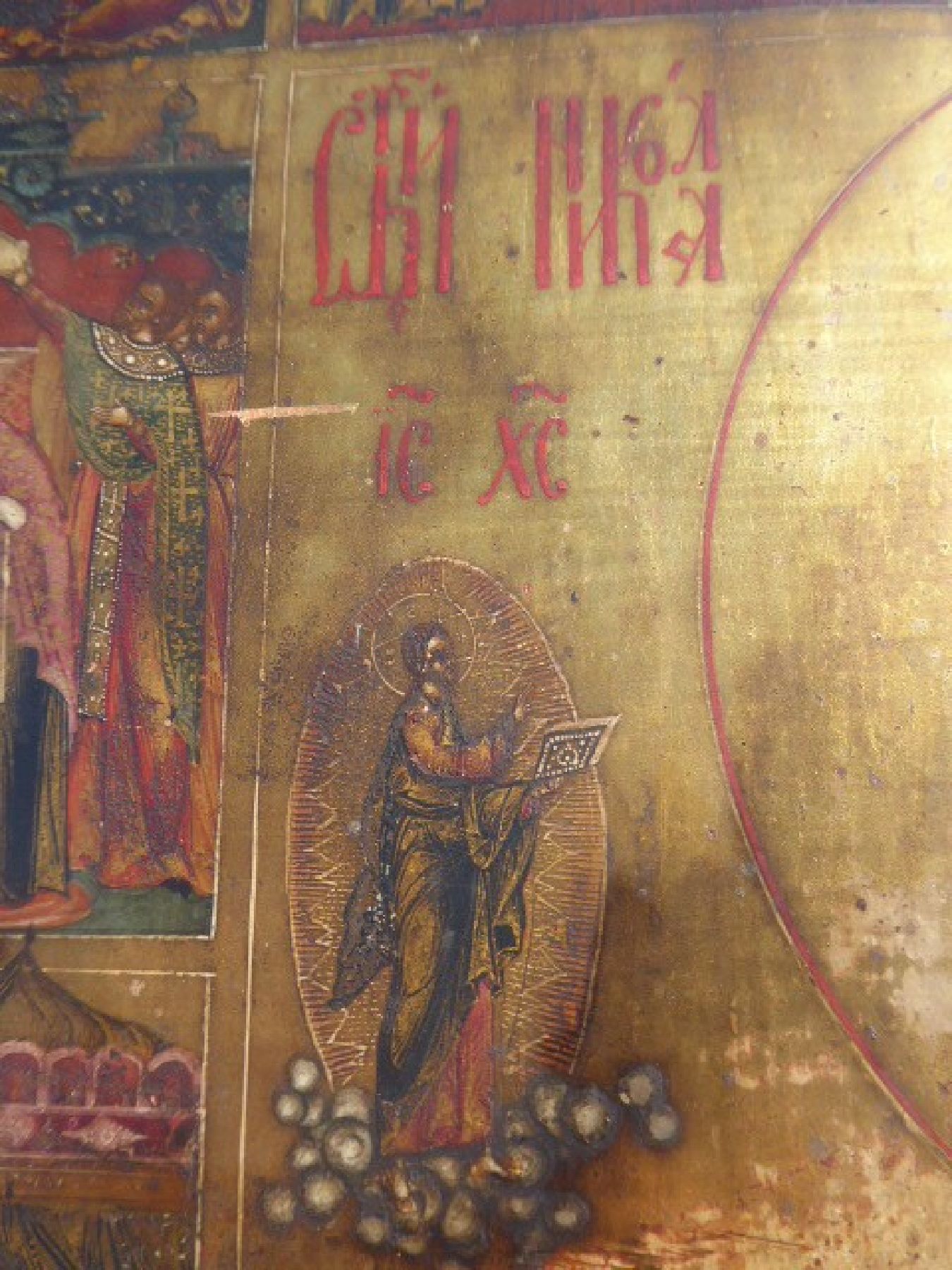Detail d: Große Ikone, Russland, 18./19. Jh.,, Vielfelderikone, Farben teilweise gelockert, ca. 54 x 43 cm, am oberen Rand teilweise abgeblättert