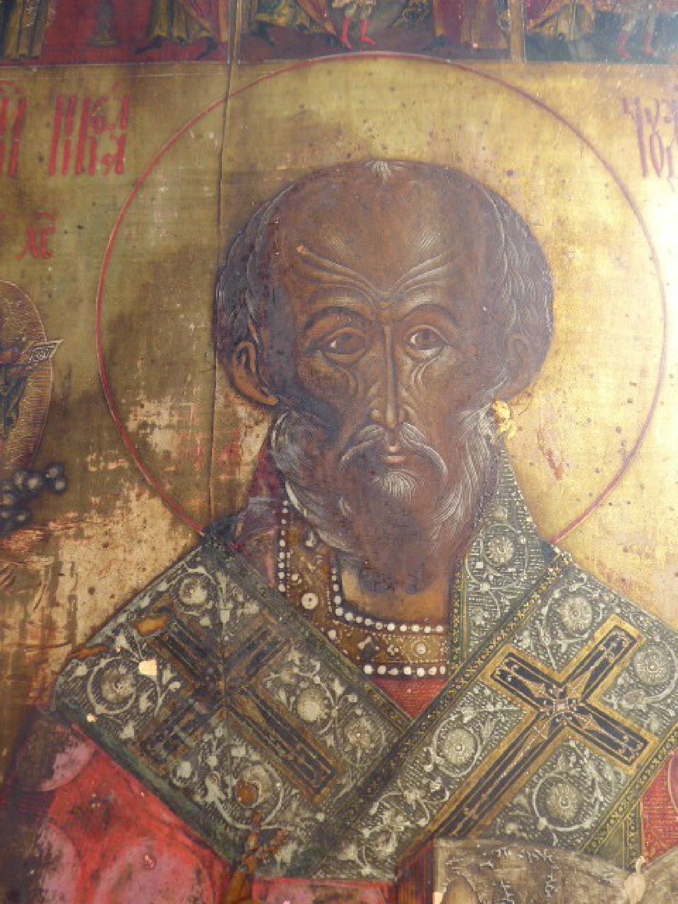 Detail f: Große Ikone, Russland, 18./19. Jh.,, Vielfelderikone, Farben teilweise gelockert, ca. 54 x 43 cm, am oberen Rand teilweise abgeblättert
