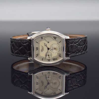 Image 25880937 - CHOPARD 18k white gold tonneau shaped gents wristwatch with power reserve indicator reference 2248, self winding, back with 8 screws, sapphire crystal, partial engine turned silvered dial patinated, power reserve indicator at 3, date at 6, jeweled crown, measures approx. 38 x 33 mm, condition 2-3