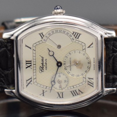 25880937b - CHOPARD 18k white gold tonneau shaped gents wristwatch with power reserve indicator reference 2248, self winding, back with 8 screws, sapphire crystal, partial engine turned silvered dial patinated, power reserve indicator at 3, date at 6, jeweled crown, measures approx. 38 x 33 mm, condition 2-3