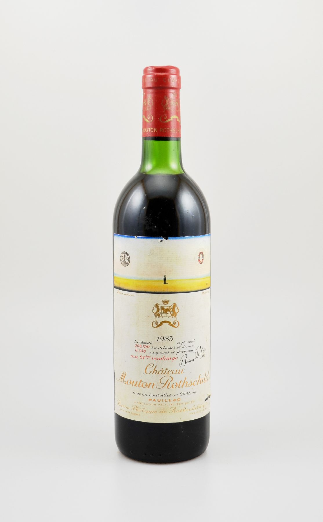 1 Flasche 1983 Chateau Mouton Rothschild, Pauillac, Premier Grand Cru Classe, ca. 75 cl,Füllstand: ca. mid shoulder, Etikett l. beschmutzt bzw. ...
