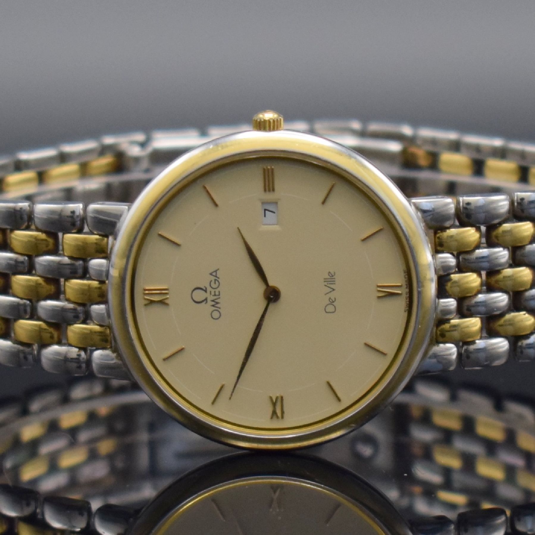Detail a: OMEGA Armbanduhr Serie De Ville, Schweiz um 1990, Ref. 396.2379, Edelstahl/Gold kombiniert inkl. Gliederband m. Faltschl., quarz, Boden aufgedr., ...