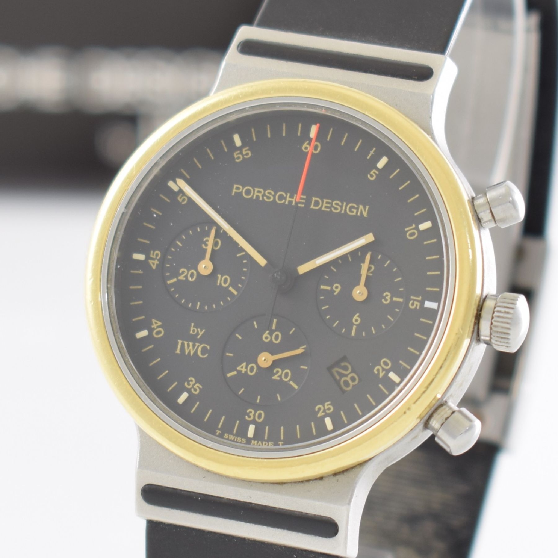 Detail c: IWC / PORSCHE DESIGN Armbandchronograph, Ref. 3720, quarz, Edelstahlgeh. inkl. Kautschukband m. Faltschl., Boden & Krone ver-schr., Goldlünette, ...