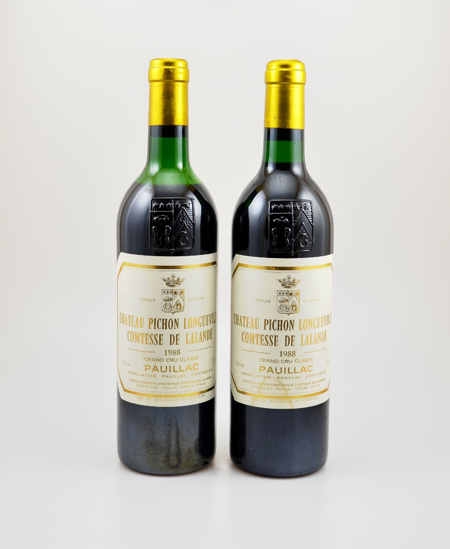 2 Flaschen 1988 Chateau Pichon Longueville Comtesse de Lalande, Pauillac, Grand Cru Classe, je ca. 75 cl, 12,5 % Vol., Füllstände: 1x into neck & ...