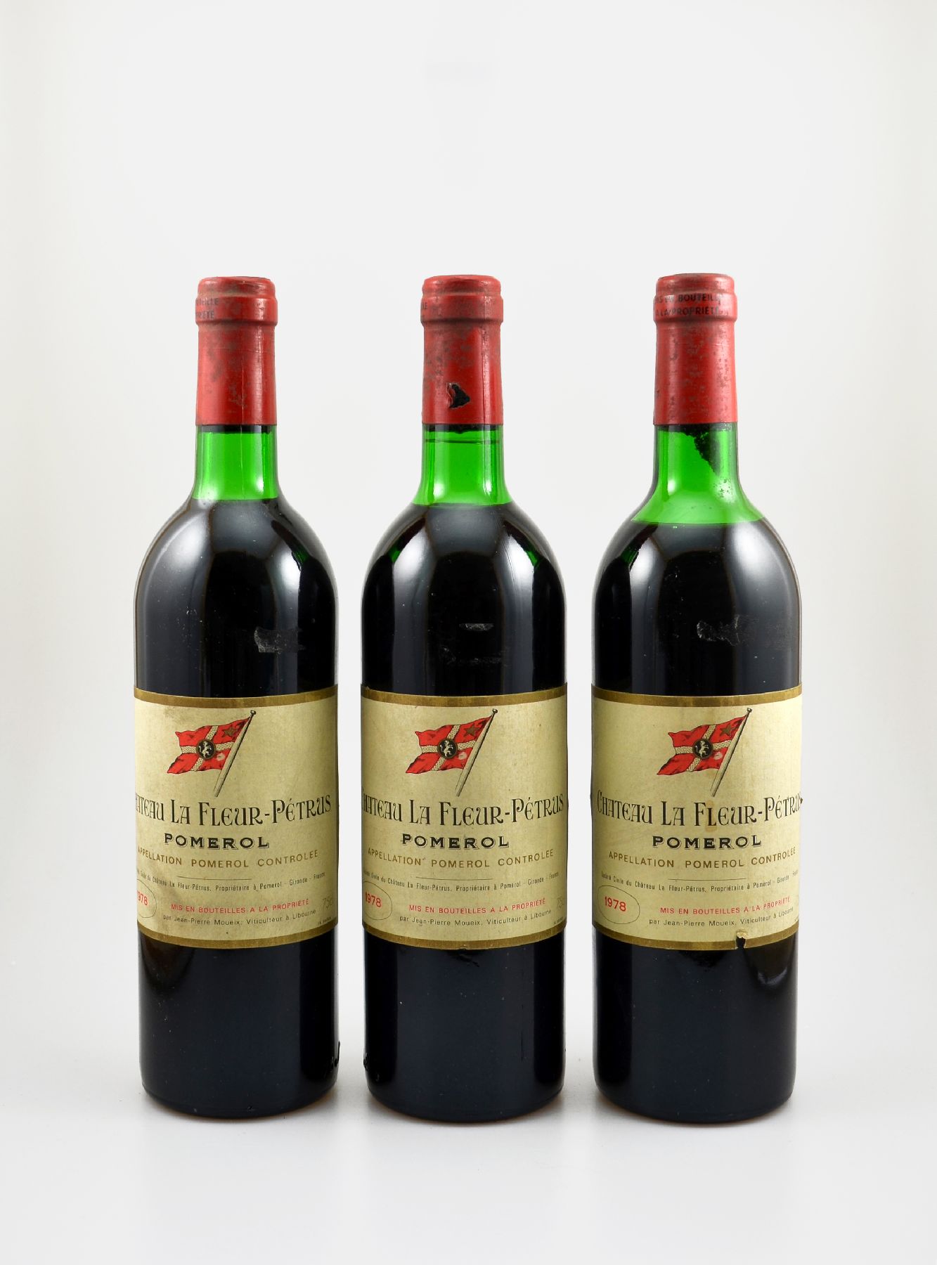 3 Flaschen 1978 Chateau La Fleur-Petrus, Pomerol, je ca. 75 cl, Füllstände: 2x top shoulder & 1x upper mid shoulder, Etiketten l. beschmutzt, ...