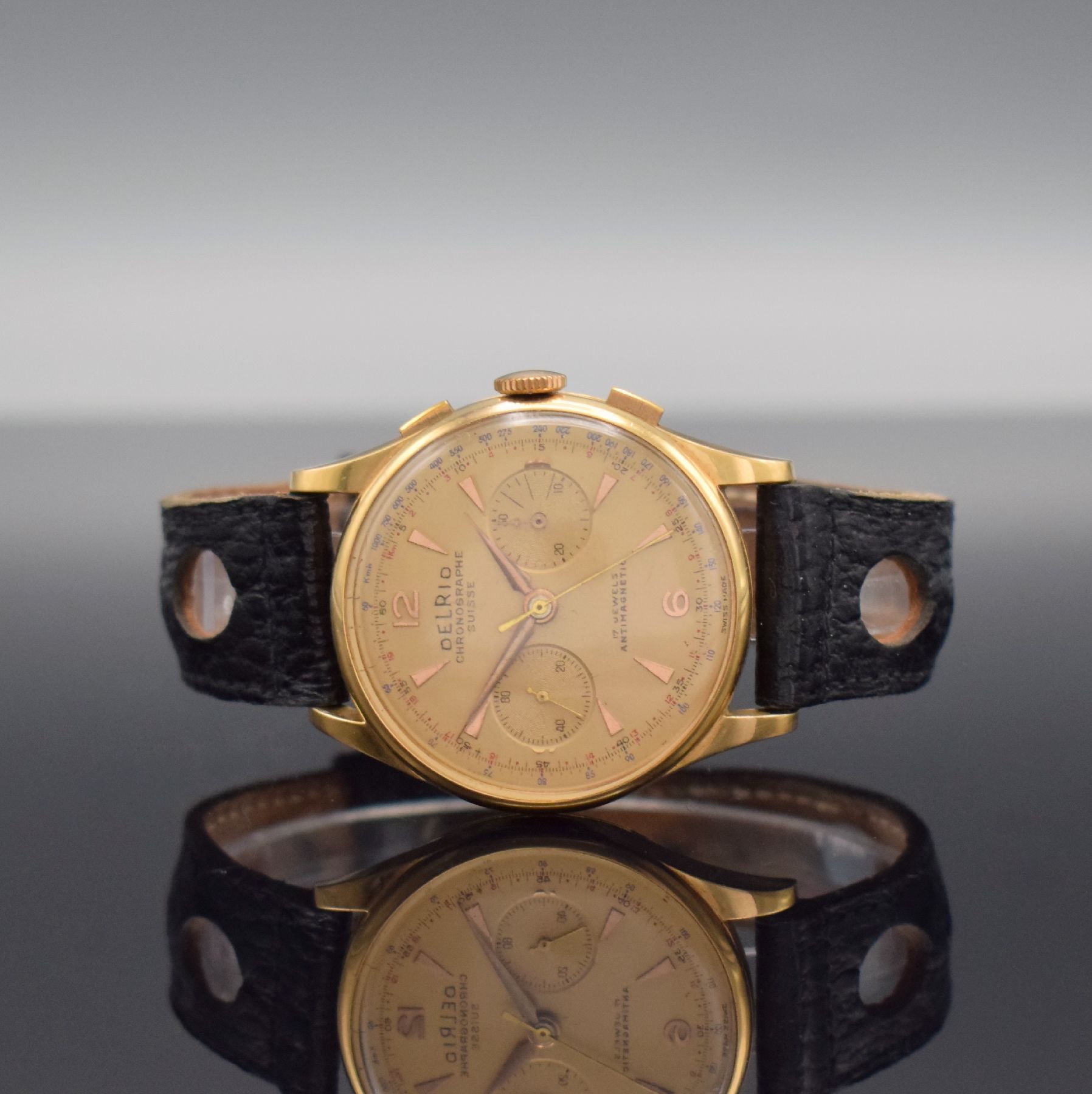 DELRIO / Chronographe Suisse Herrenarmbanduhr mit Chronograph in RG 750/000, Schweiz um 1950, Handaufzug, 3-teil. Geh. dell., Boden & Glasrand ...