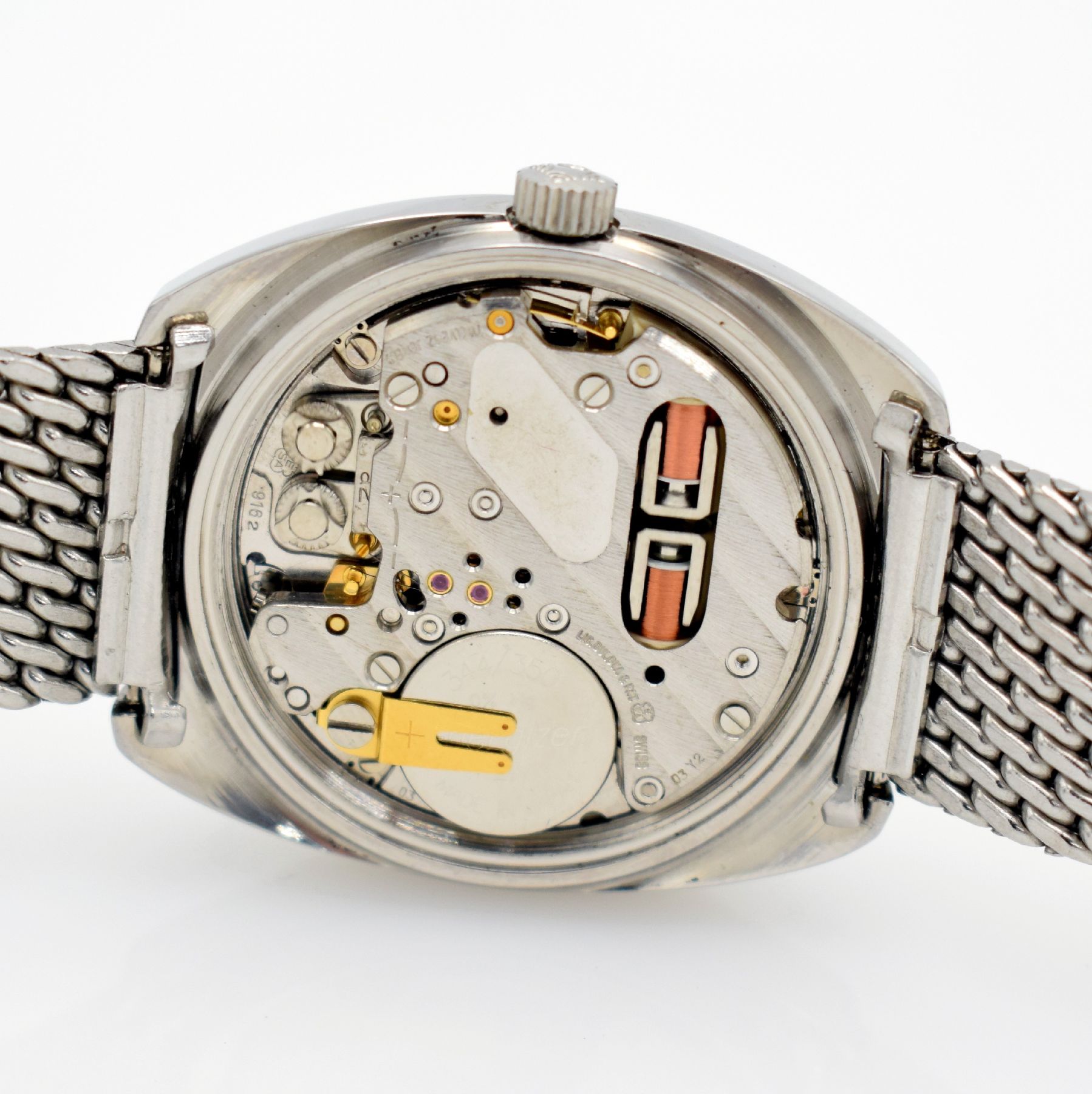 Detail i: ZENITH XL-Tronic Herrenarmbanduhr in Stahl, Schweiz um 1970, Stimmgabel-Werk, verschr. Geh. Ref. 01-0061-500, orig. Stahl- Milanaiseband, blaues ...