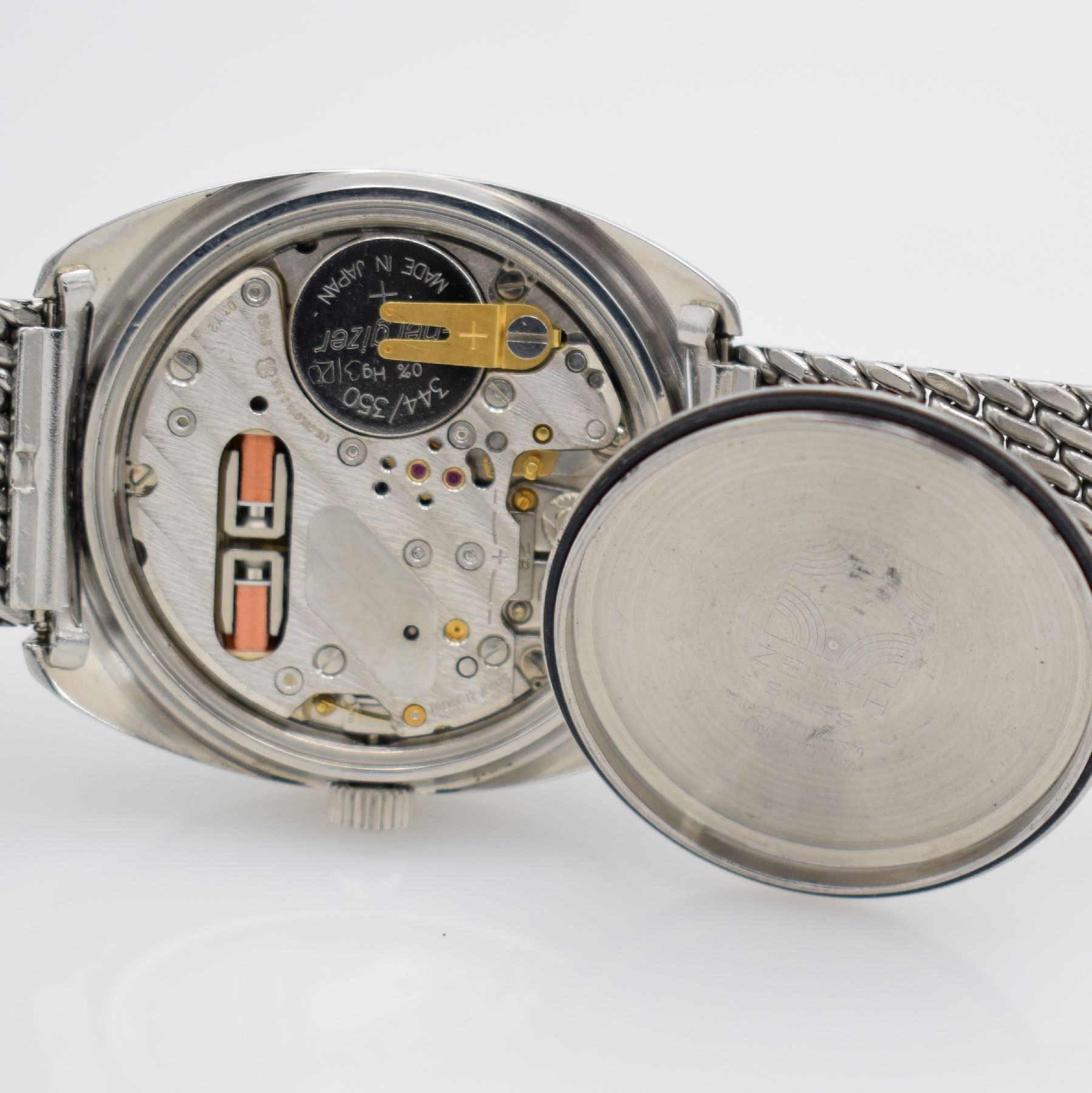 Detail k: ZENITH XL-Tronic Herrenarmbanduhr in Stahl, Schweiz um 1970, Stimmgabel-Werk, verschr. Geh. Ref. 01-0061-500, orig. Stahl- Milanaiseband, blaues ...