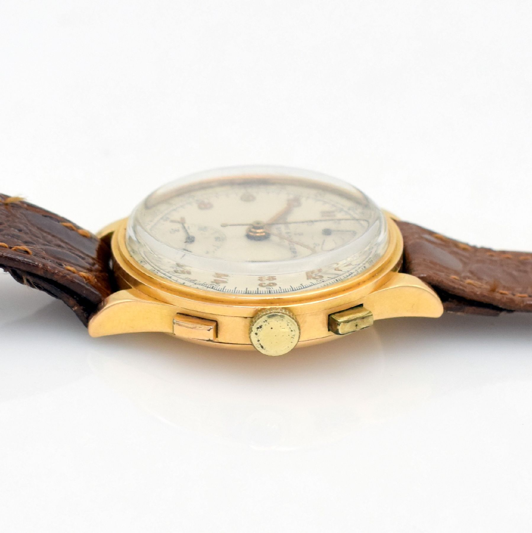 Detail c: BAUME & MERCIER Schaltradchronograph in RG 750/000, Handaufzug, Schweiz um 1945, Boden & Glasrand aufgedr., silb. Zifferbl. m. arab. Std., rotgold. ...