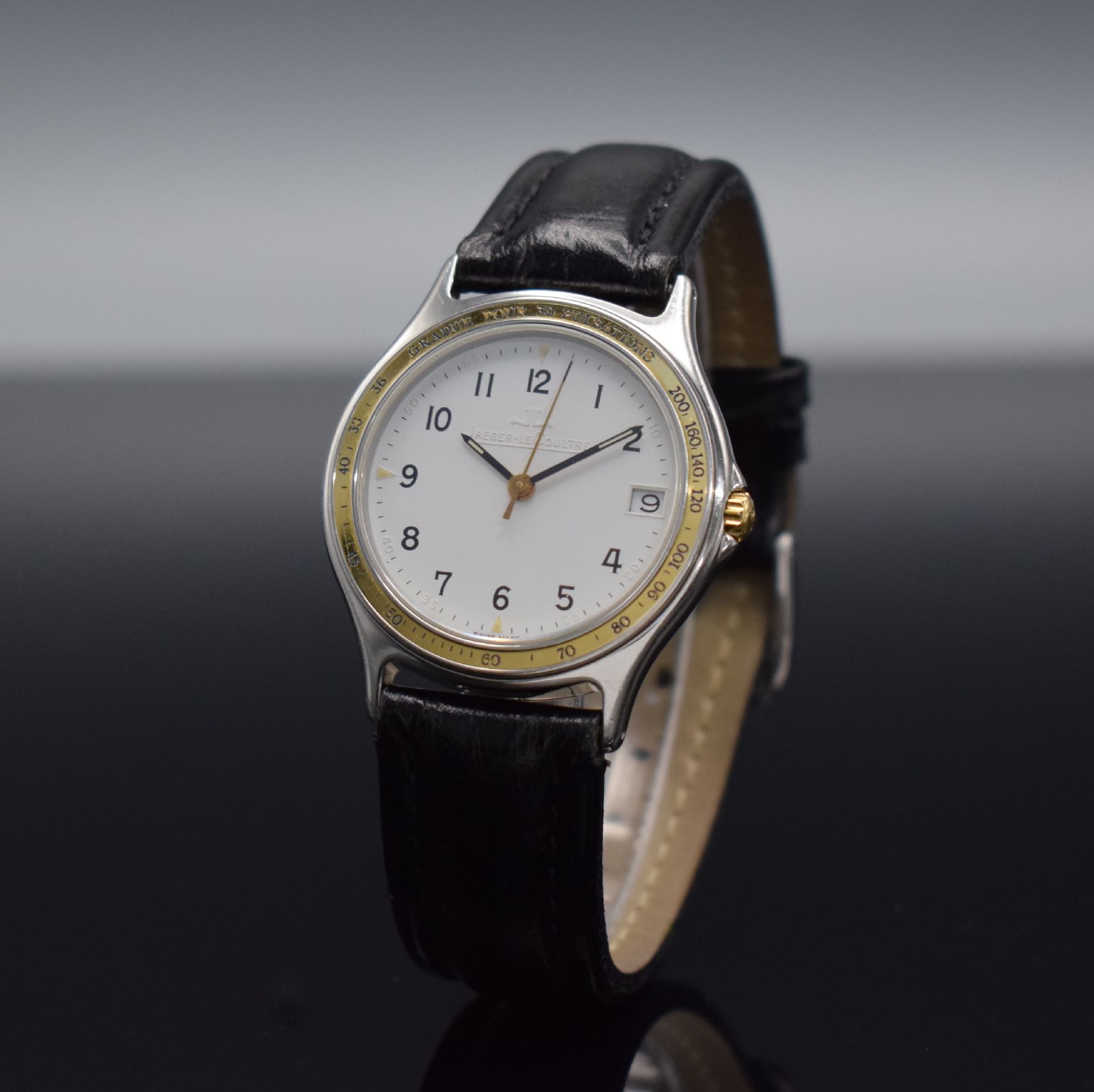Detail b: Jaeger-LeCoultre Armbanduhr in Stahl/Gold, Schweiz um 1985, 4-fach verschr. Geh. Ref. 113.5.06, eingel. Goldlünette m. Pulsations- skala, quarz, ...