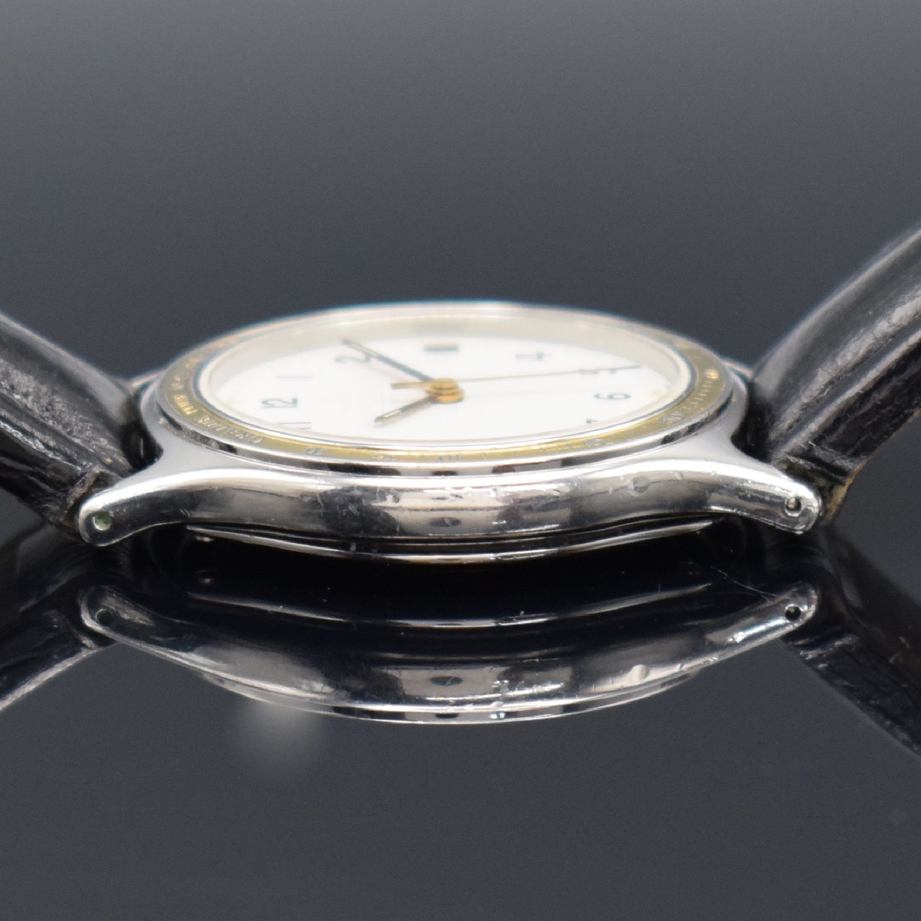 Detail d: Jaeger-LeCoultre Armbanduhr in Stahl/Gold, Schweiz um 1985, 4-fach verschr. Geh. Ref. 113.5.06, eingel. Goldlünette m. Pulsations- skala, quarz, ...