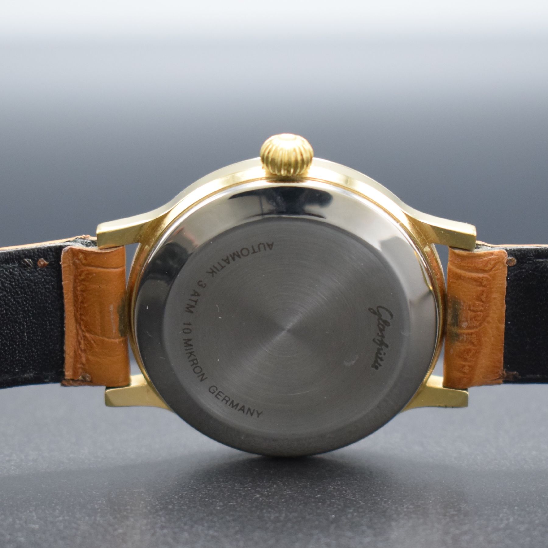 Detail e: GLASHÜTTE ORIGINAL Spezimat große Armbanduhr Kal. 10-30, Deutschland um 1992, Automatik, verg. Geh. m. aufgedr. Stahlboden, orig. Lederband, neutr. ...