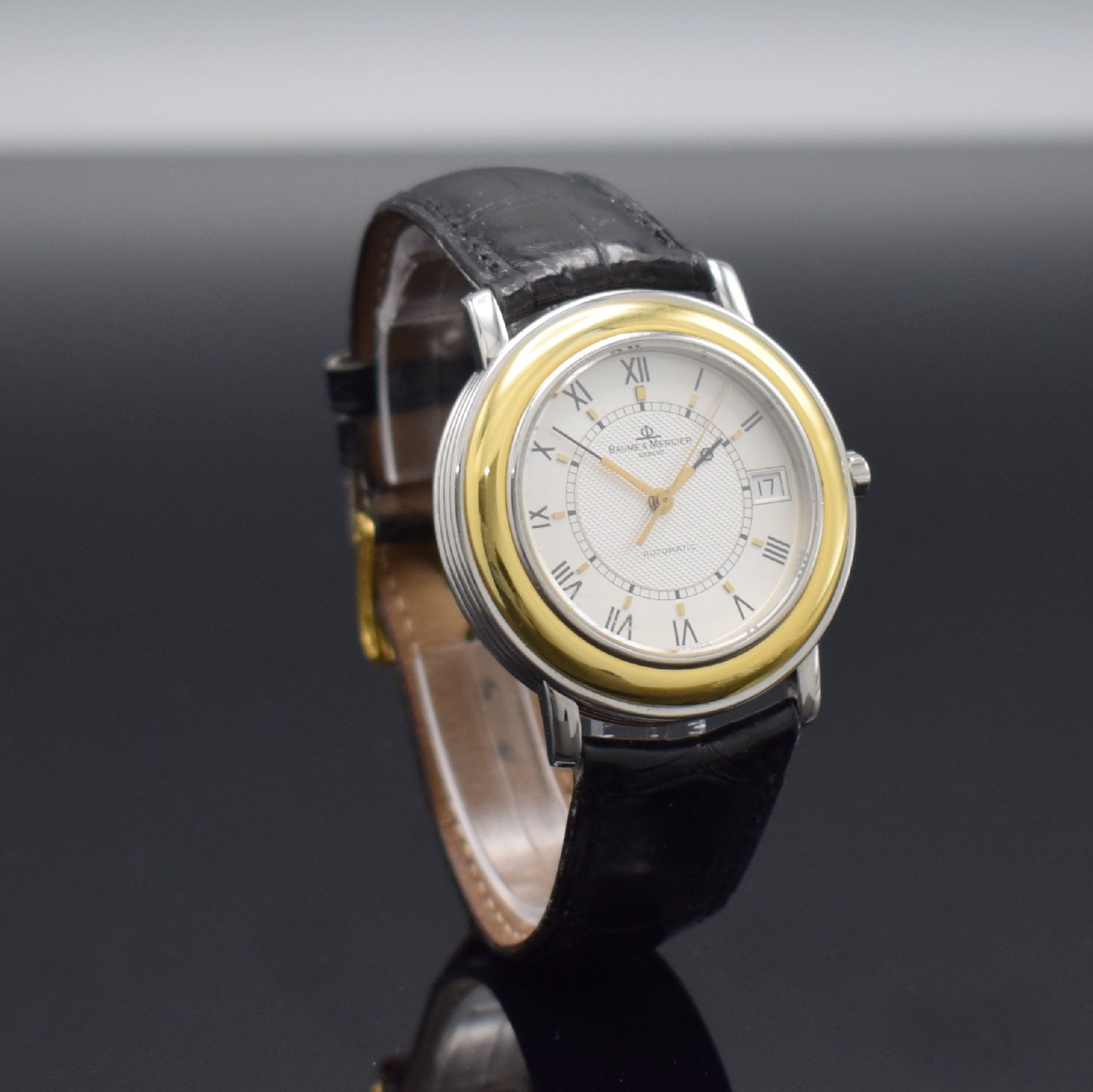 Detail d: BAUME & MERCIER Fleetwood Herrenarmbanduhr in Edelstahl/Gold, Schweiz um 1995, Automatik, Ref. 3137.018, Boden 6-fach verschr. 2x Schr. fehl., ...