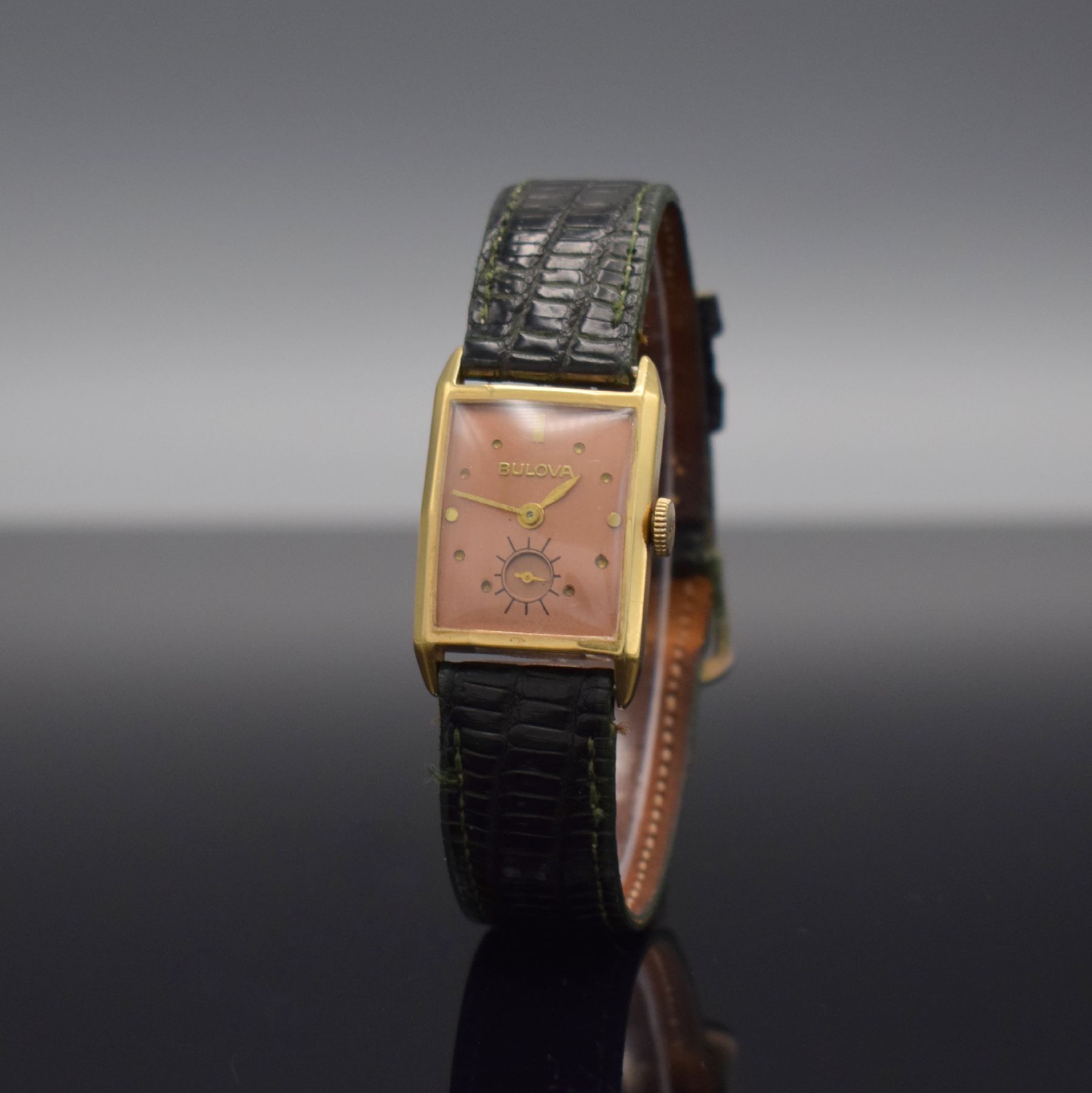 Detail b: BULOVA Armbanduhr in GG 585/000, Schweiz/USA um 1940, Handaufzug, 2-teil. Gehäuse, Boden aufgedr., kupferfarb. rest. Zifferbl., gold. Zeiger, Kal. ...