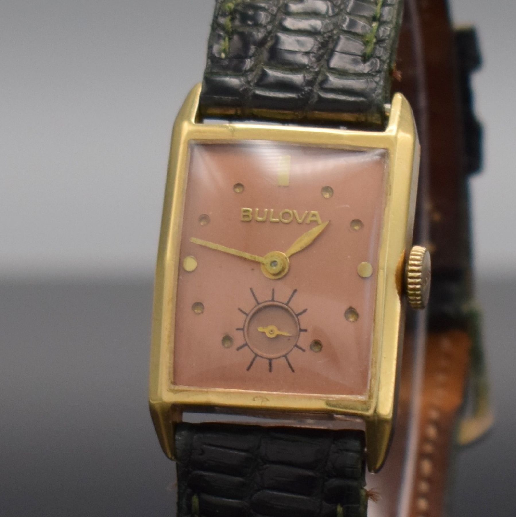 Detail c: BULOVA Armbanduhr in GG 585/000, Schweiz/USA um 1940, Handaufzug, 2-teil. Gehäuse, Boden aufgedr., kupferfarb. rest. Zifferbl., gold. Zeiger, Kal. ...