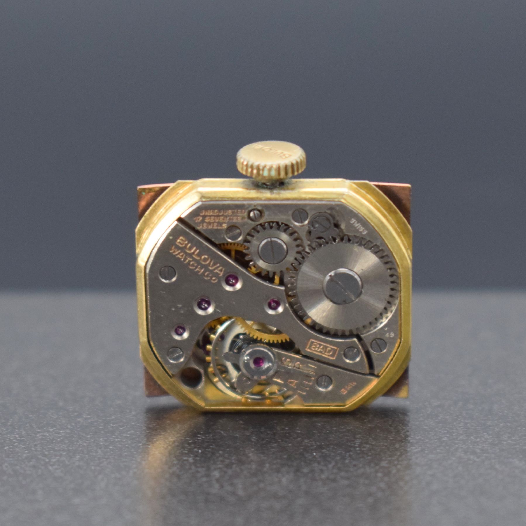 Detail h: BULOVA Armbanduhr in GG 585/000, Schweiz/USA um 1940, Handaufzug, 2-teil. Gehäuse, Boden aufgedr., kupferfarb. rest. Zifferbl., gold. Zeiger, Kal. ...