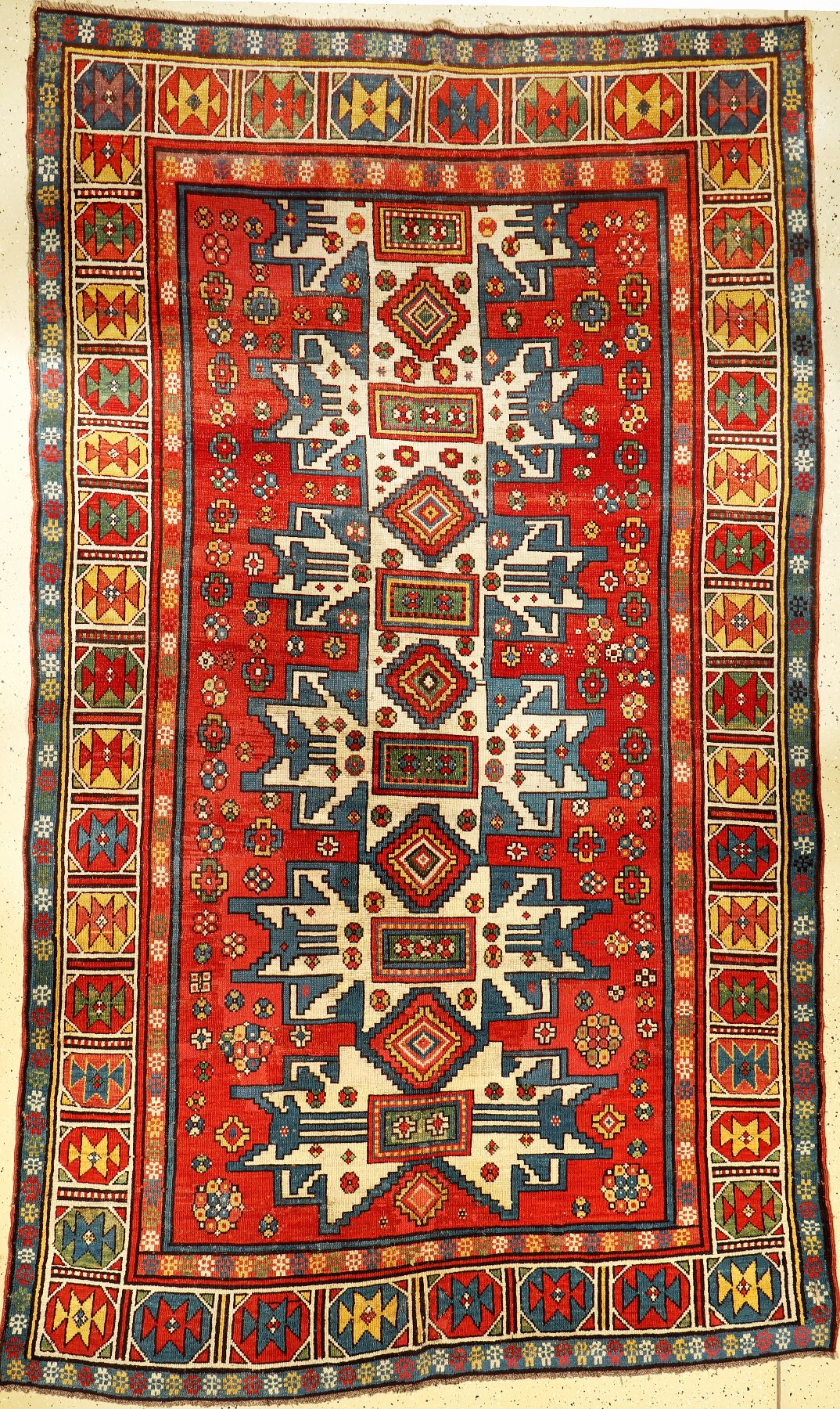Großer Kasak antik, Kaukasus, Lesghi Sterne, 19.Jhd., Wolle auf Wolle, ca. 300 x 180 cm, selten, EHZ: 4, kleiner Riss.
