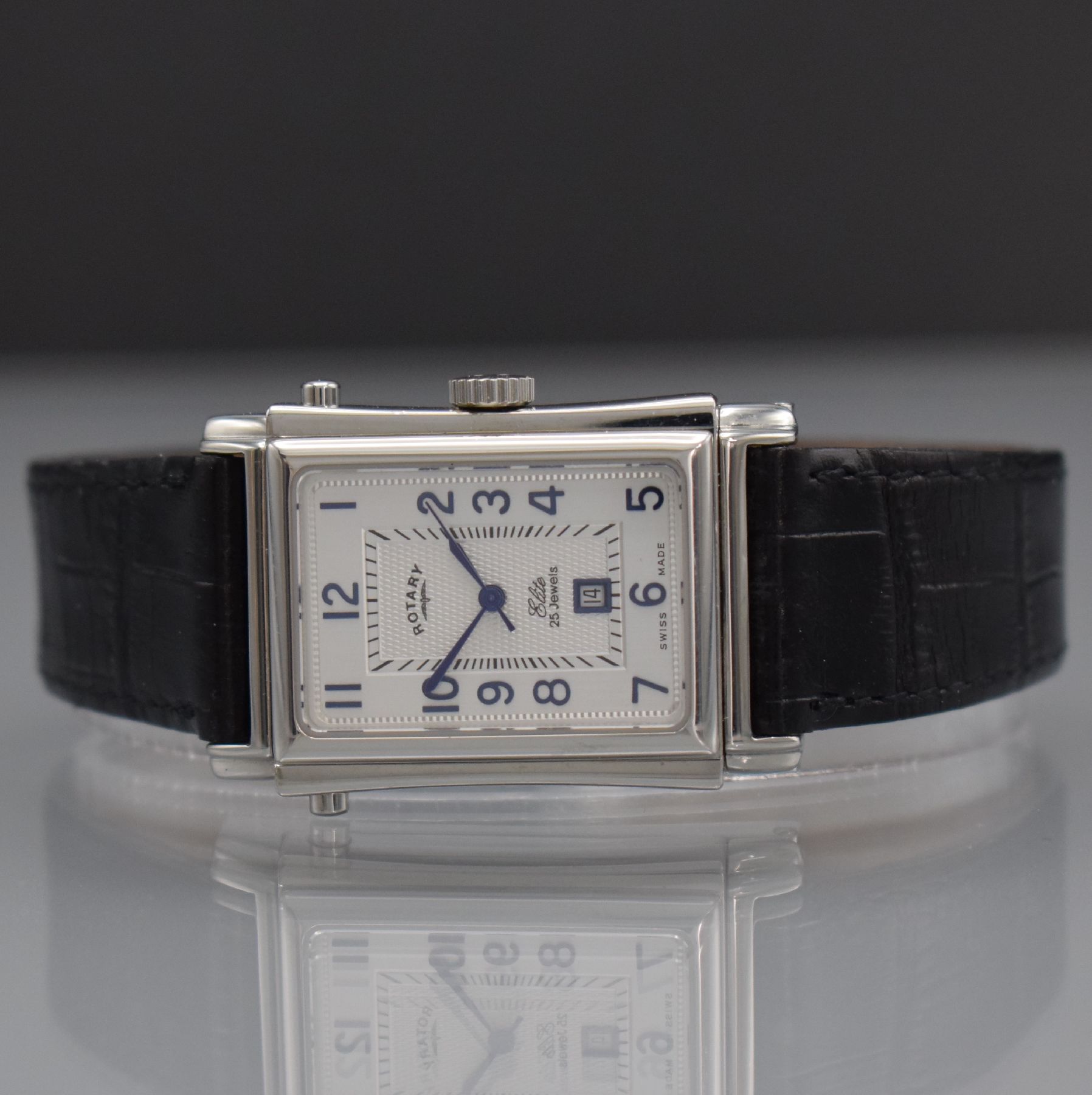ROTARY rechteckige drehbare Herrenarmbanduhr in Stahl, Schweiz um 2001, Automatik, beids. vergl. Wendegeh., Boden 8-fach verschr., silb. Zifferbl. m. ...