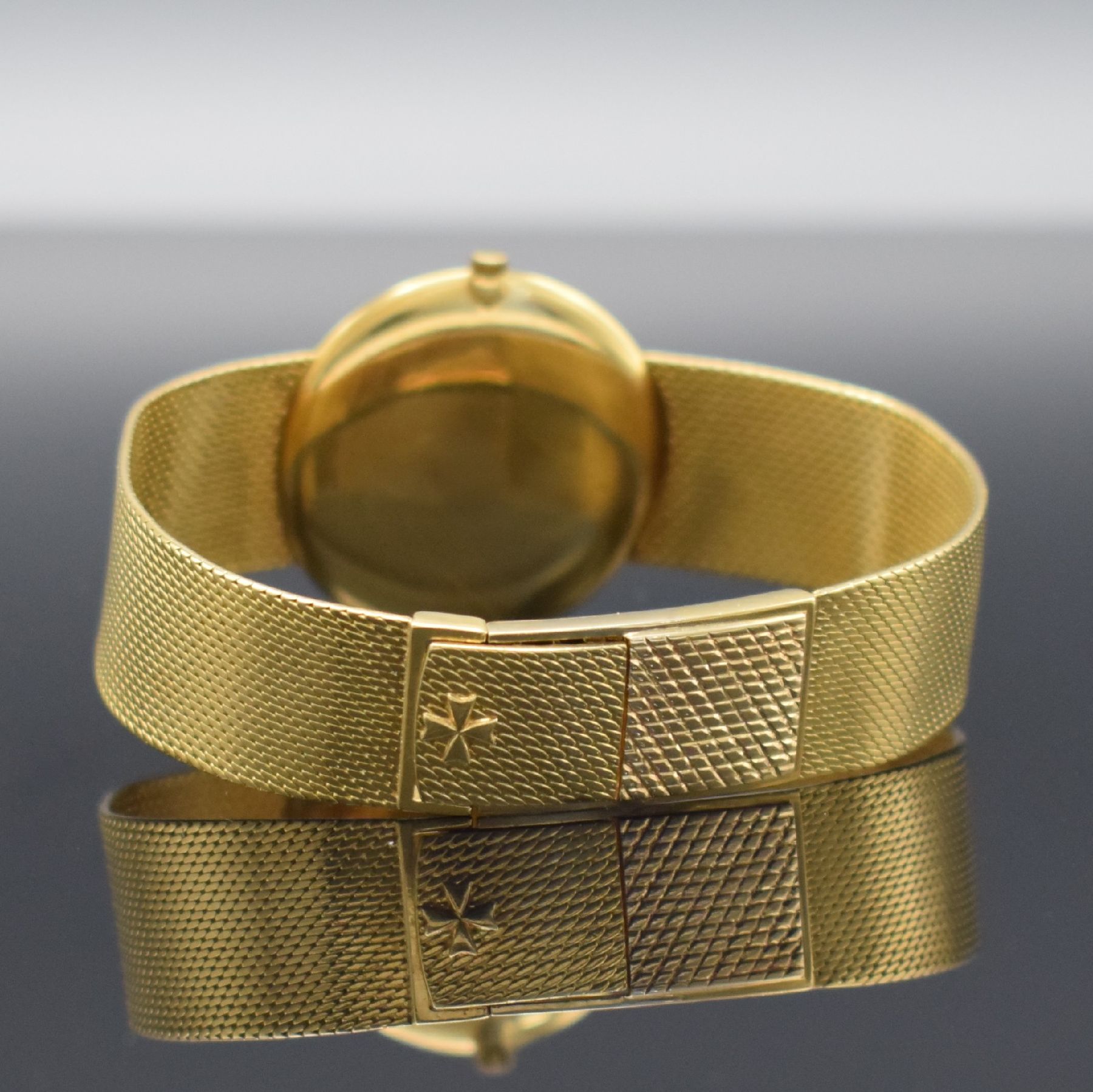 Detail f: VACHERON & CONSTANTIN elegante Armbanduhr in GG 750/000 Referenz 6352, Handaufzug, Schweiz um 1965, Boden aufgedr., verlängertes Milanaiseband m. ...