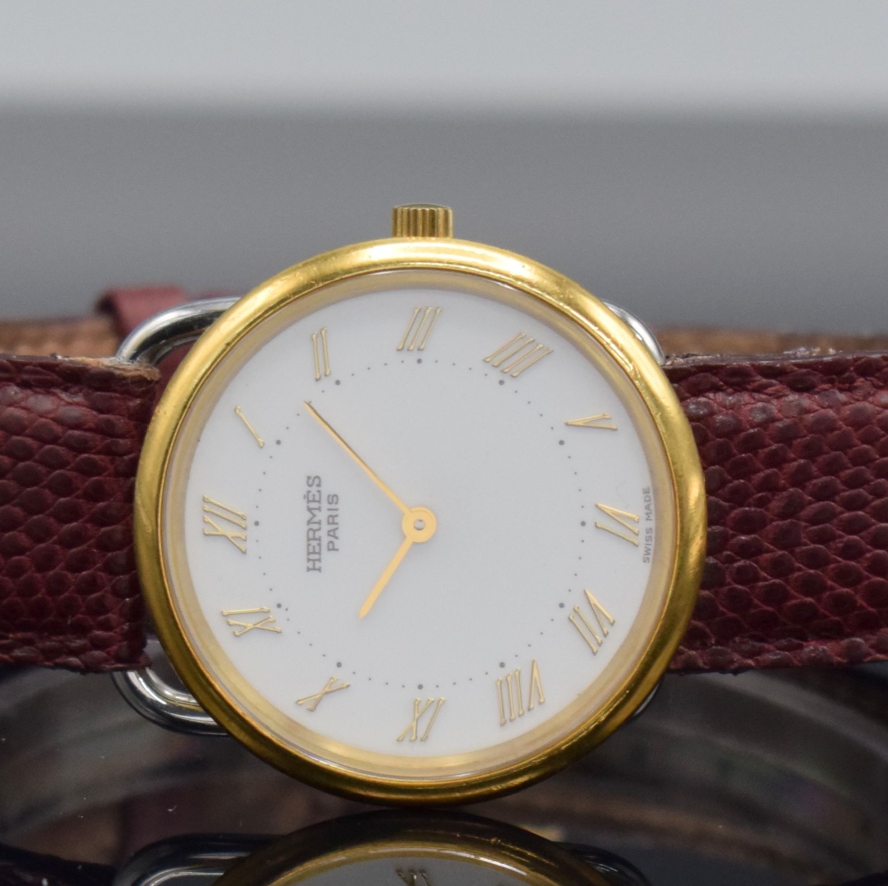 Detail a: HERMES Paris Armbanduhr in Edelstahl/Gold, Schweiz um 2000, quarz, stilisierte Bandanstöße, Boden & Lünette aufgedr., weißes Zifferbl. mit ...