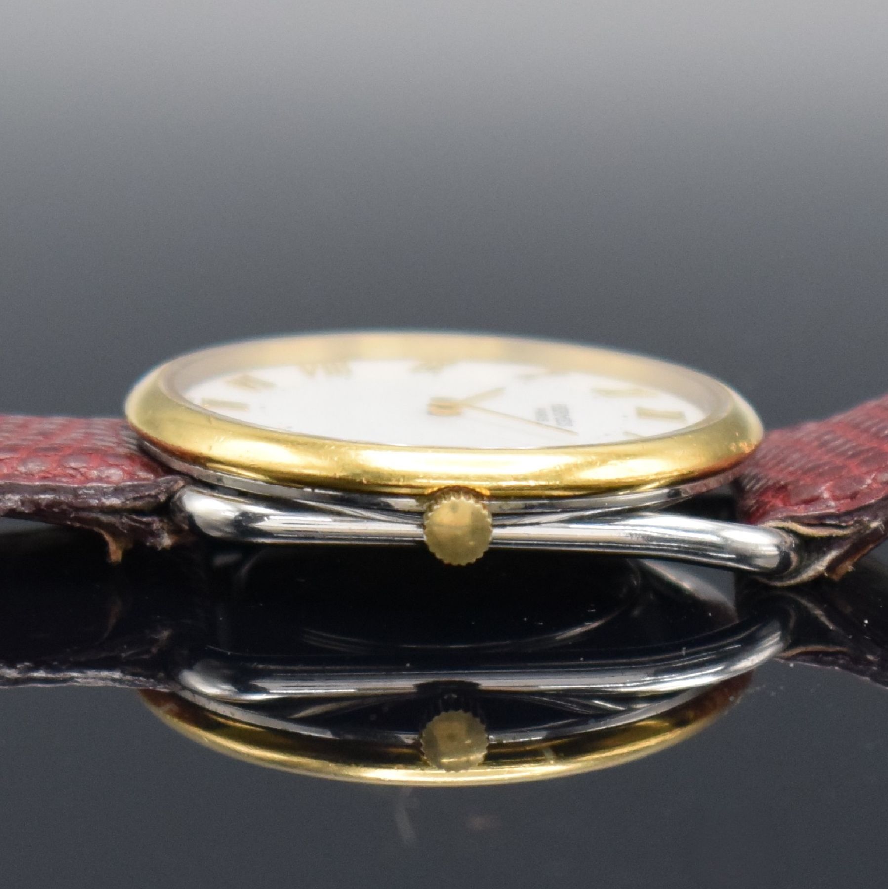 Detail c: HERMES Paris Armbanduhr in Edelstahl/Gold, Schweiz um 2000, quarz, stilisierte Bandanstöße, Boden & Lünette aufgedr., weißes Zifferbl. mit ...