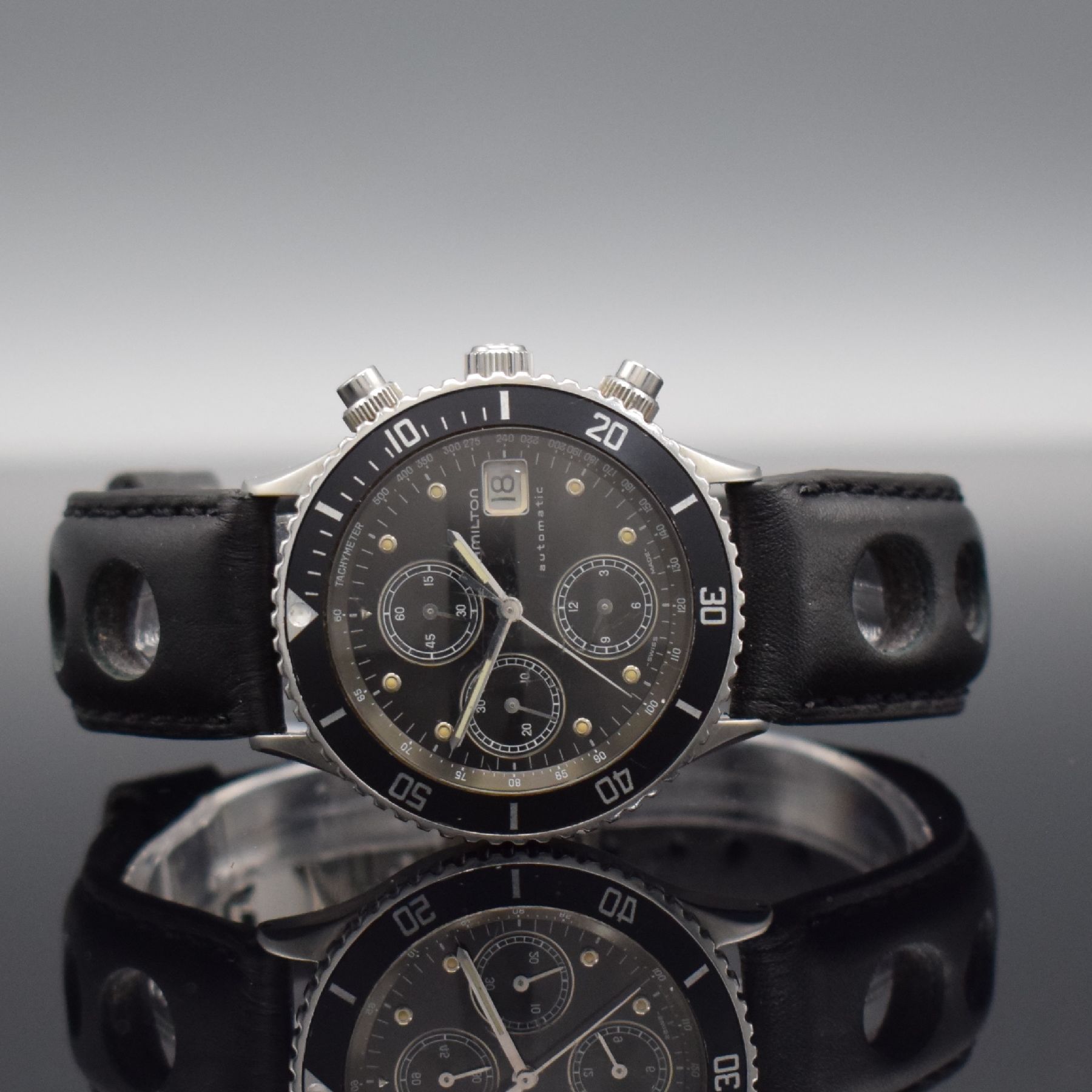 HAMILTON HTC Herrenarmbanduhr mit Chronograph, Schweiz um 1985, Automatik, Edelstahlgeh., Boden geschr., eins. drehb. Lünette mit 60- Teilung, ...