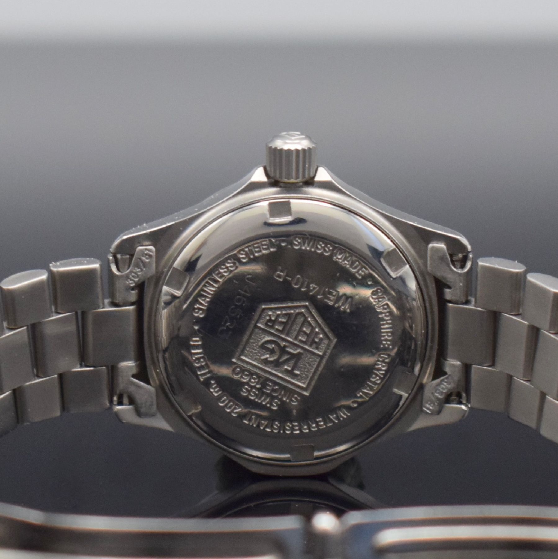 Detail f: TAG HEUER Professional Damenarmbanduhr, Schweiz um 1990, quarz, Ref. WE-1410-R, verschr. Edelstahlgeh., eins. drehb. Lünette, schwarzes Zifferbl. m. ...