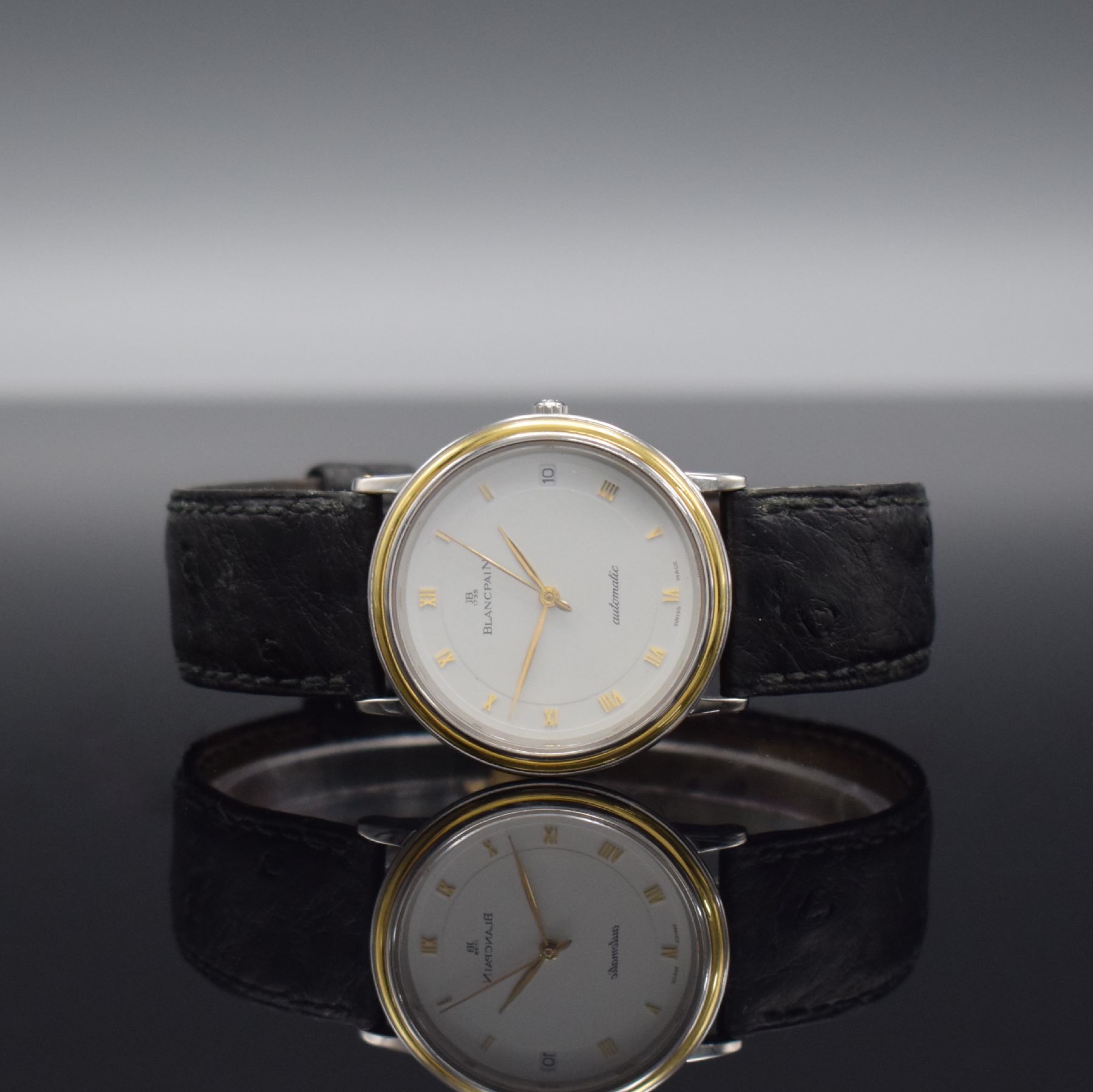 BLANCPAIN feine Herrenarmbanduhr, Automatik, Schweiz um 1990, flaches Edelstahlgeh. inkl. Lederband m. orig. Dornschl., Lünette in GG, Boden & ...