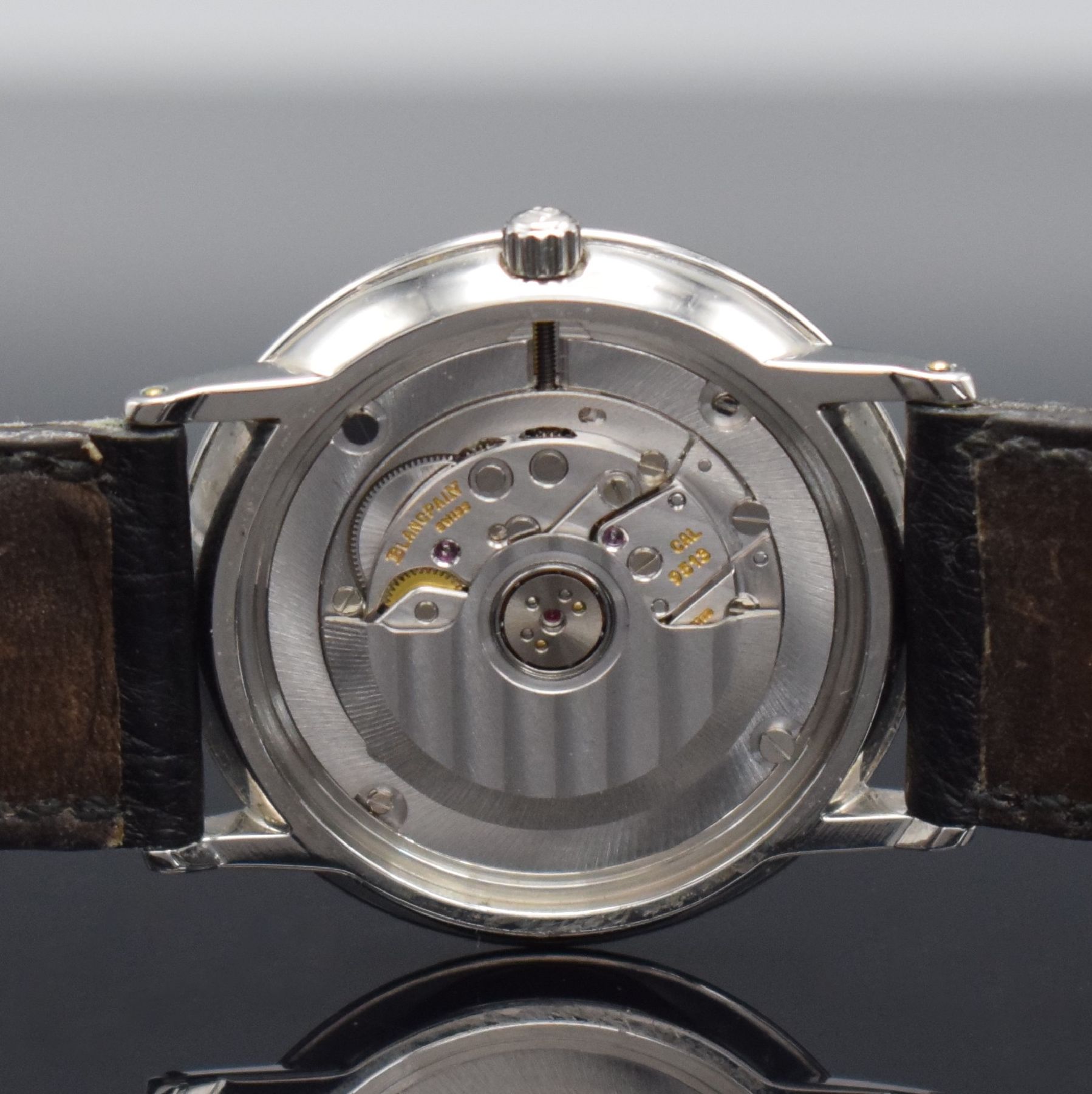 Detail g: BLANCPAIN feine Herrenarmbanduhr, Automatik, Schweiz um 1990, flaches Edelstahlgeh. inkl. Lederband m. orig. Dornschl., Lünette in GG, Boden & ...