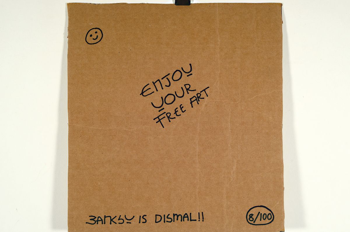 Detail a: Banksy free art Dismaland, Schablonenkomposition auf Wellpappe, rückseitig bezeichnet:" Enjoy Your Free Art, Banksy is Dismal !!", 8/100, ...
